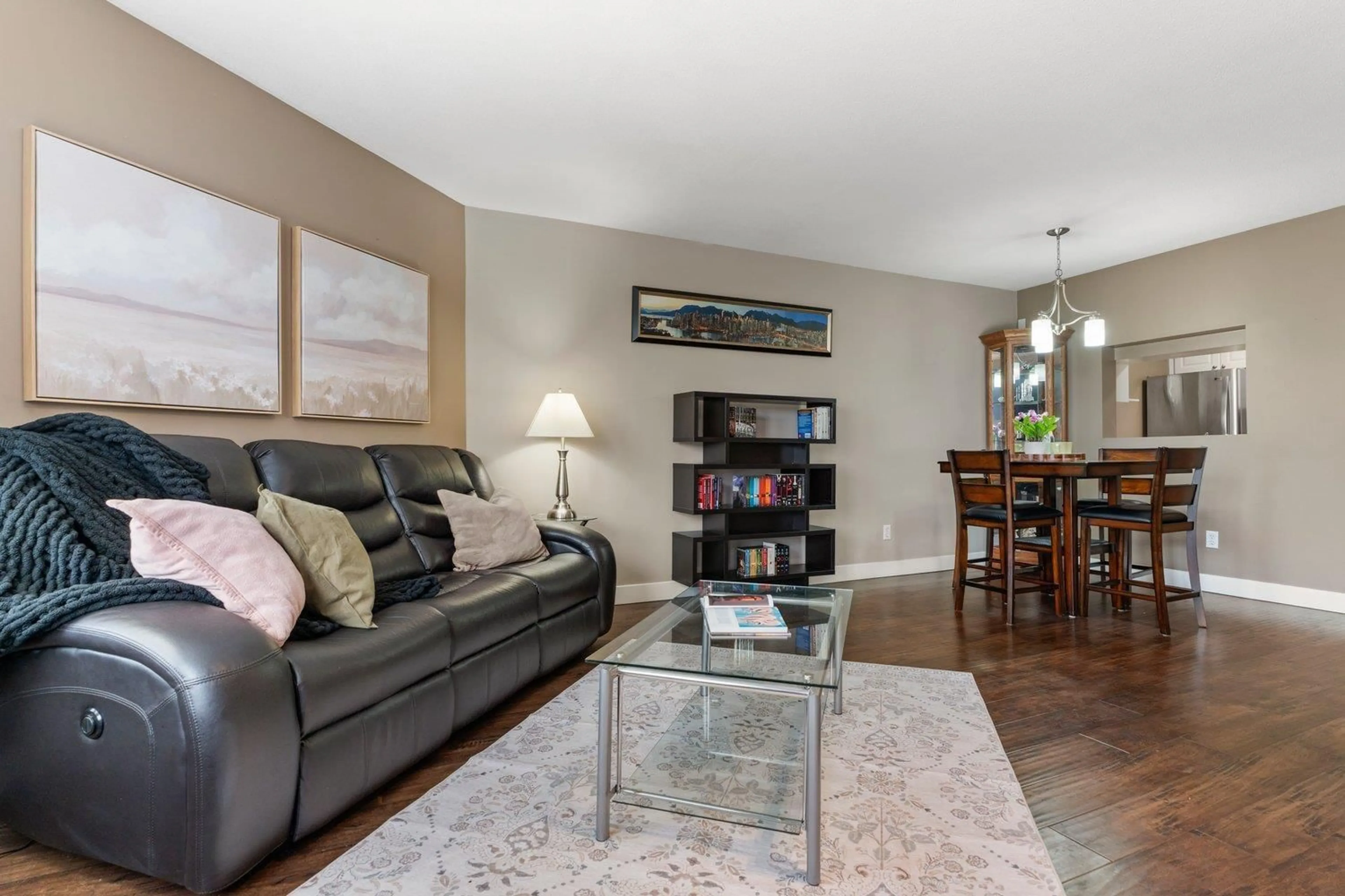 Living room with furniture, wood/laminate floor for 210 - 5765 GLOVER ROAD, Langley British Columbia V3A8M8