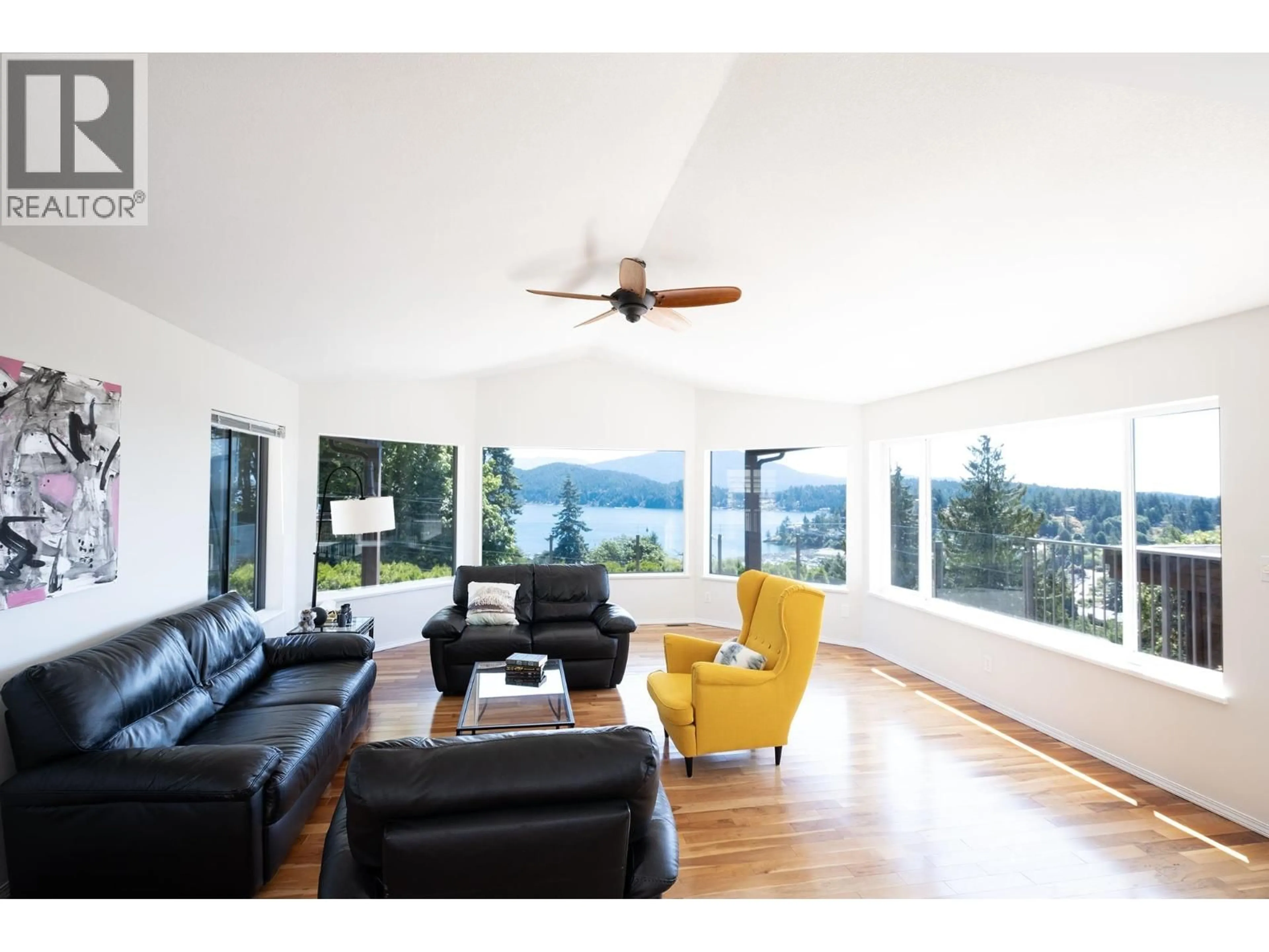 Living room with furniture, wood/laminate floor for 485 ABBS ROAD, Gibsons British Columbia V0N1V0