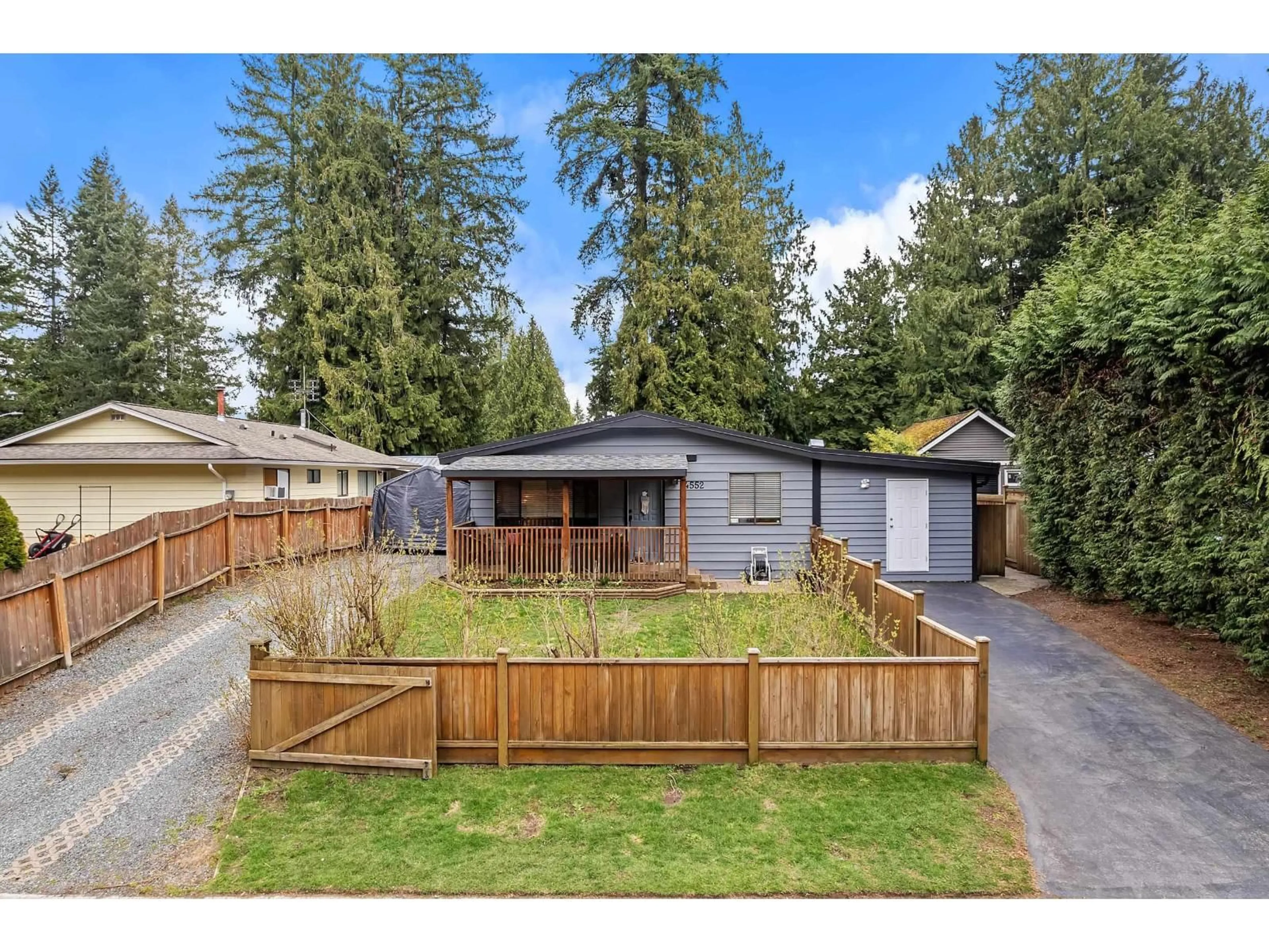 A pic from outside/outdoor area/front of a property/back of a property/a pic from drone, unknown for 4552 200A STREET, Langley British Columbia V3A6J7