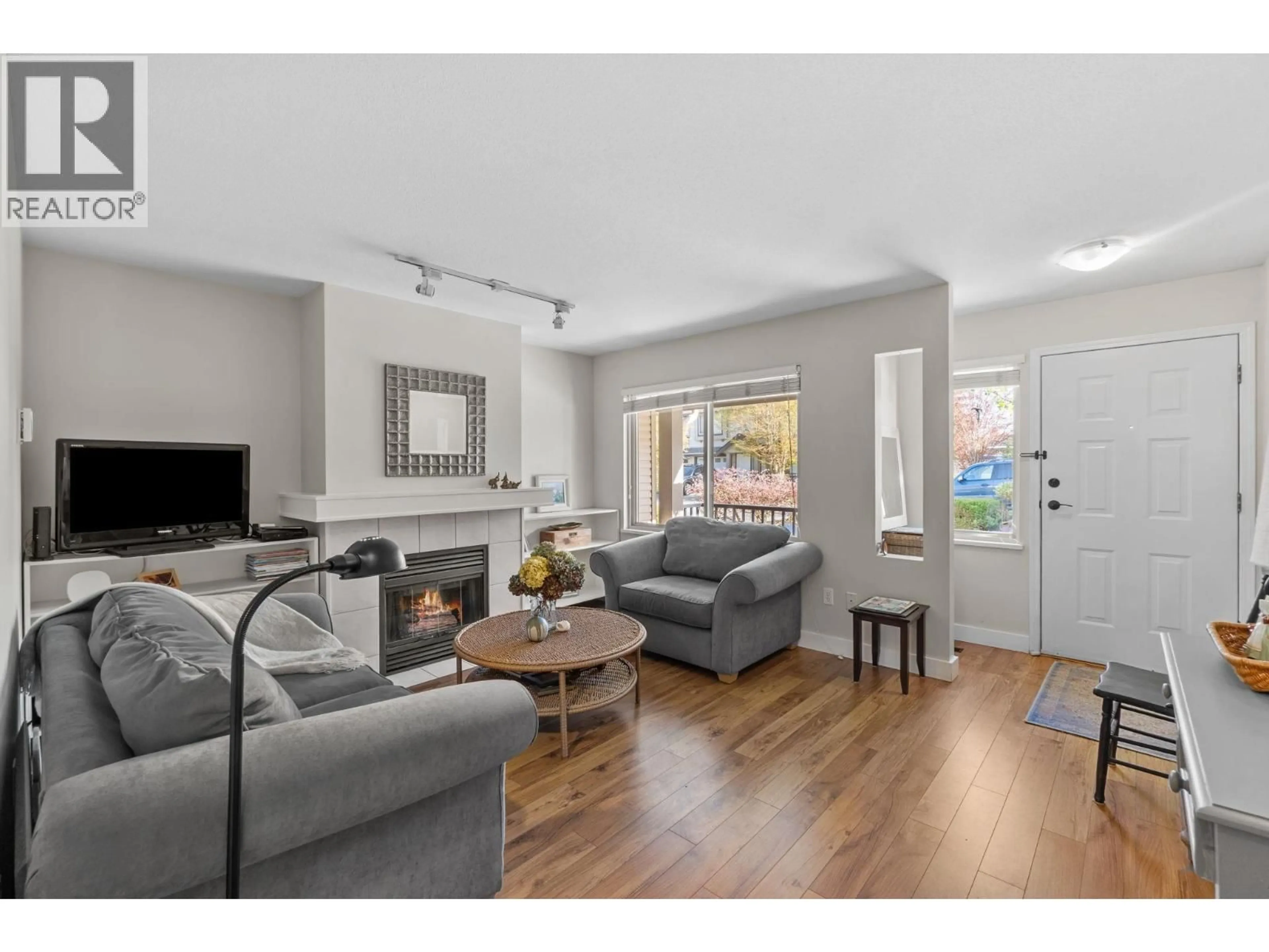 Living room with furniture, wood/laminate floor for 12 - 11860 210 STREET, Maple Ridge British Columbia V2X8A3