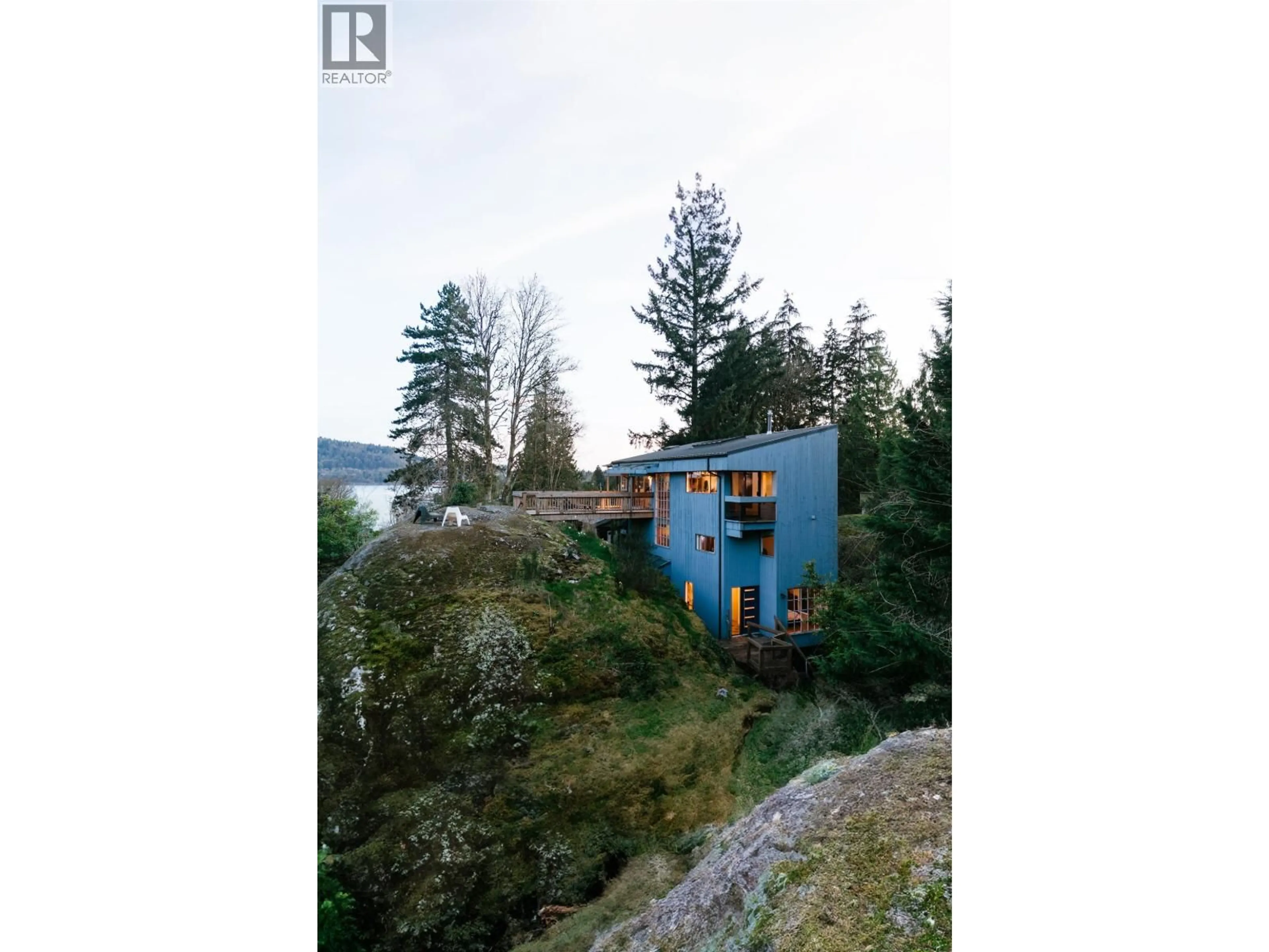 A pic from outside/outdoor area/front of a property/back of a property/a pic from drone, forest/trees view for 4477 STRATHCONA ROAD, North Vancouver British Columbia V7G1G7