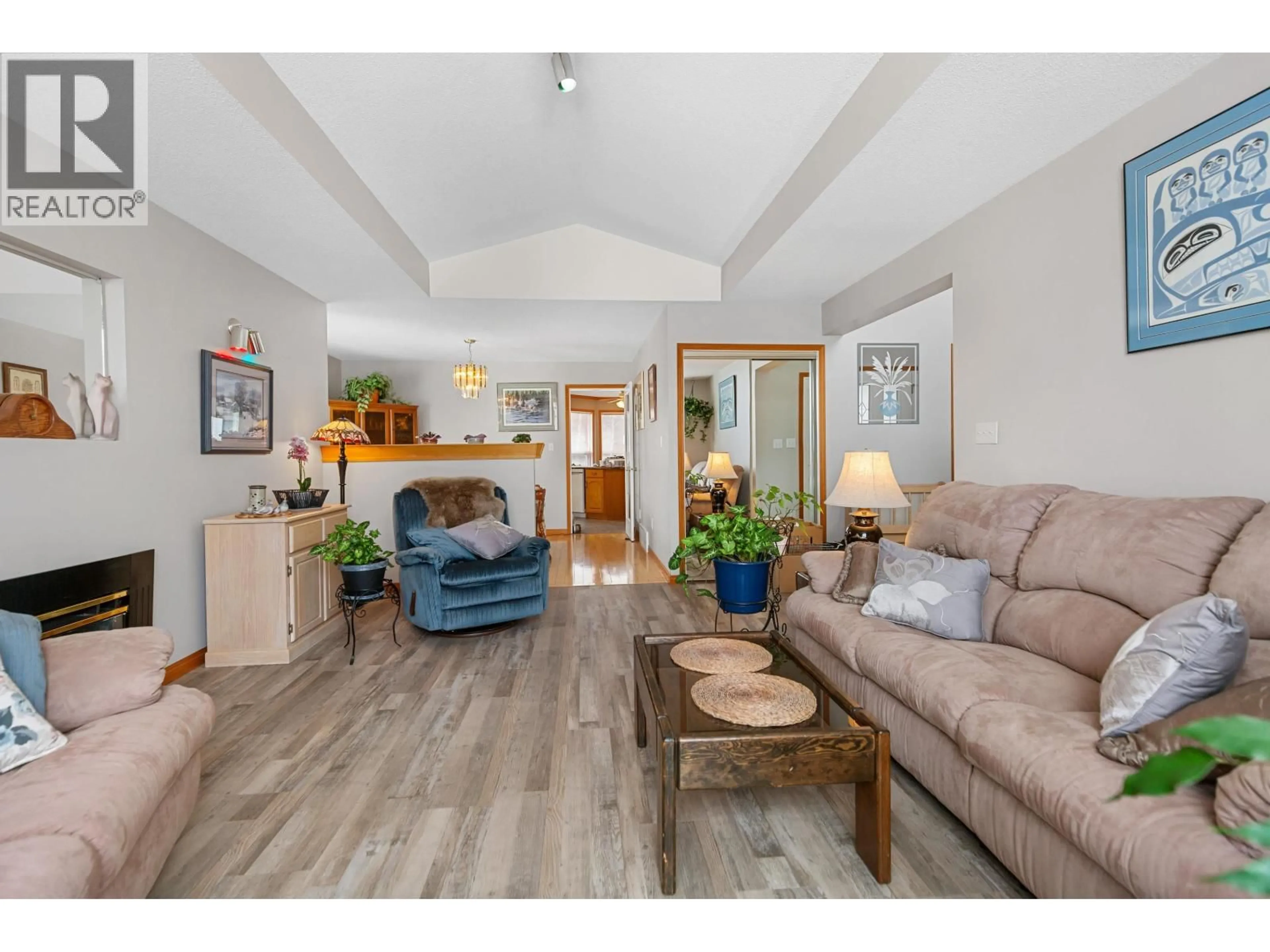 Living room with furniture, wood/laminate floor for 2687 ST ANNE AVENUE, Prince George British Columbia V2N4Y3