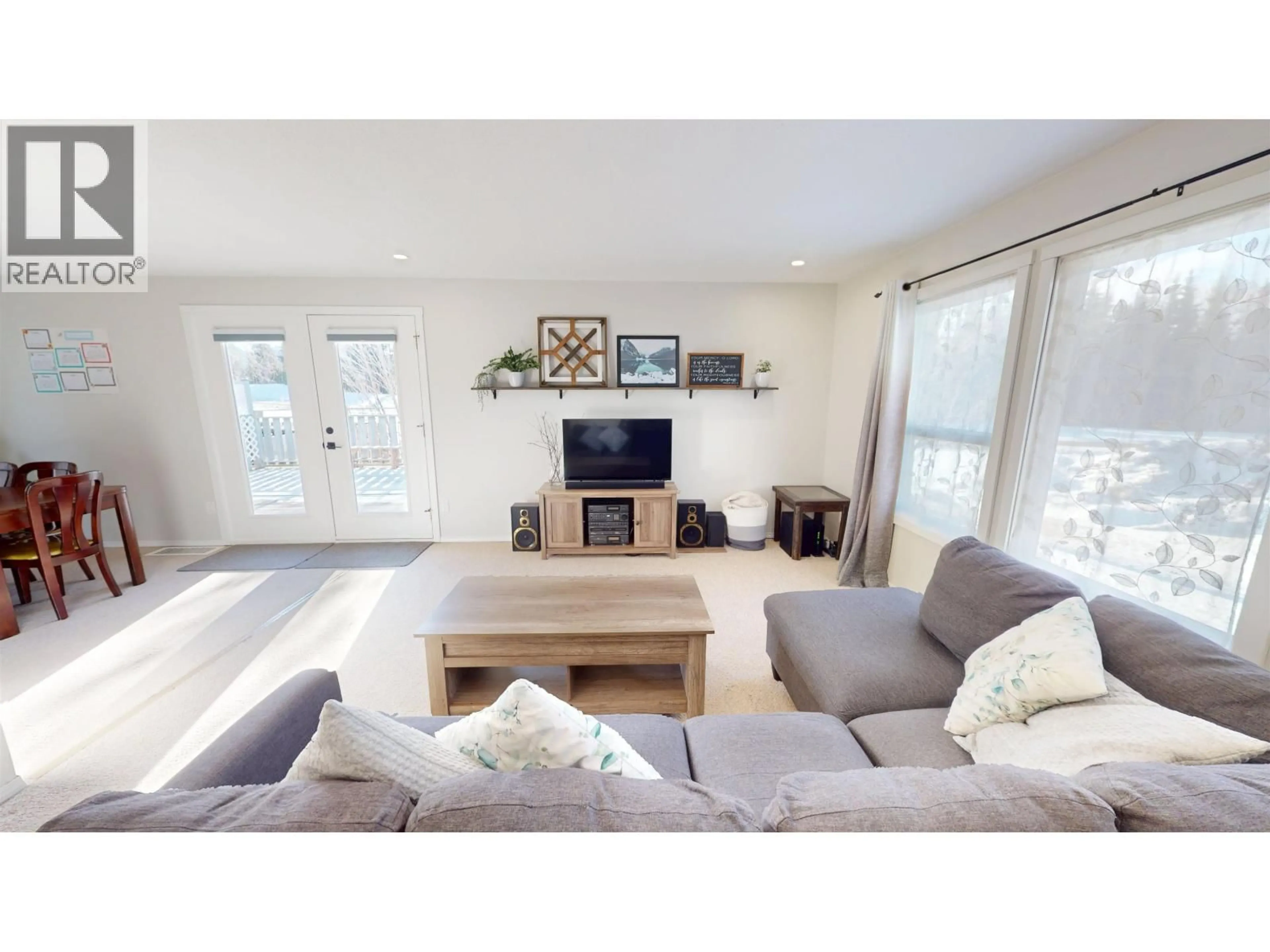 Living room with furniture, wood/laminate floor for 3364 JEWEL ROAD, Houston British Columbia V0J1Z0