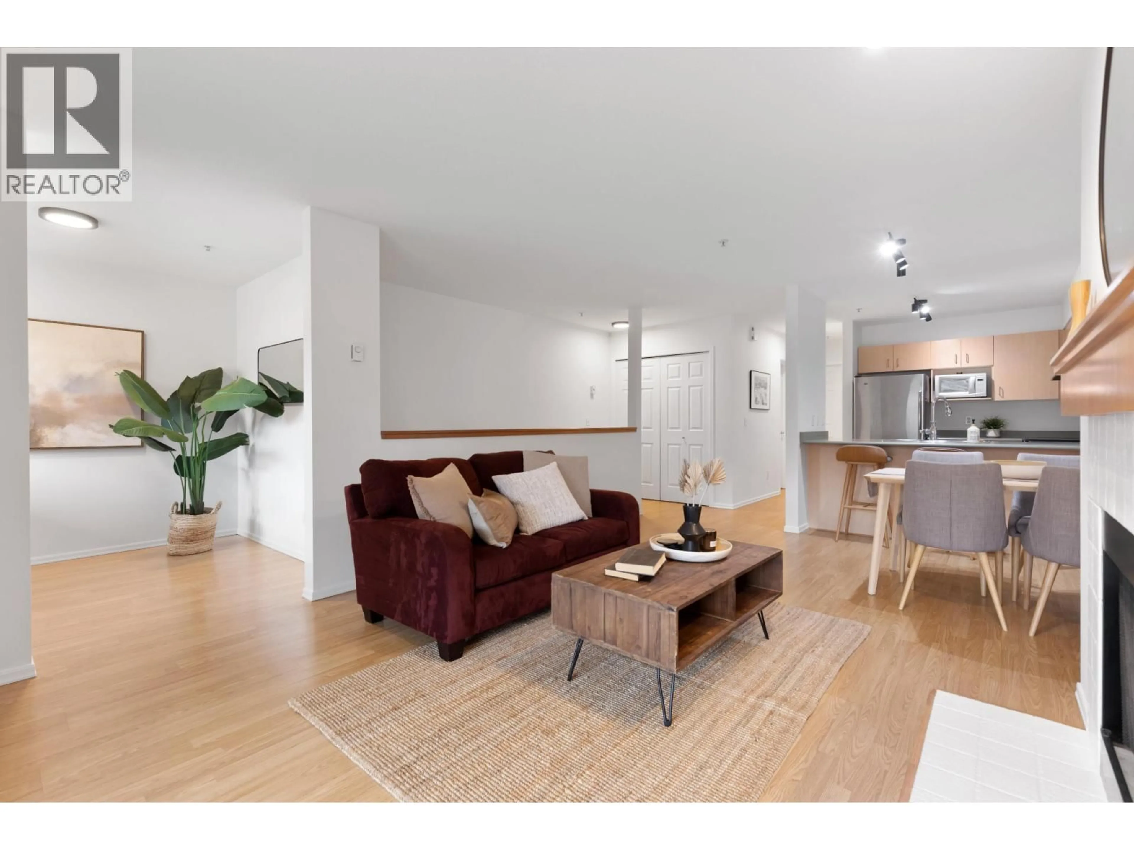 Living room with furniture, wood/laminate floor for 38 - 7410 FLINT STREET, Pemberton British Columbia V0N2L1