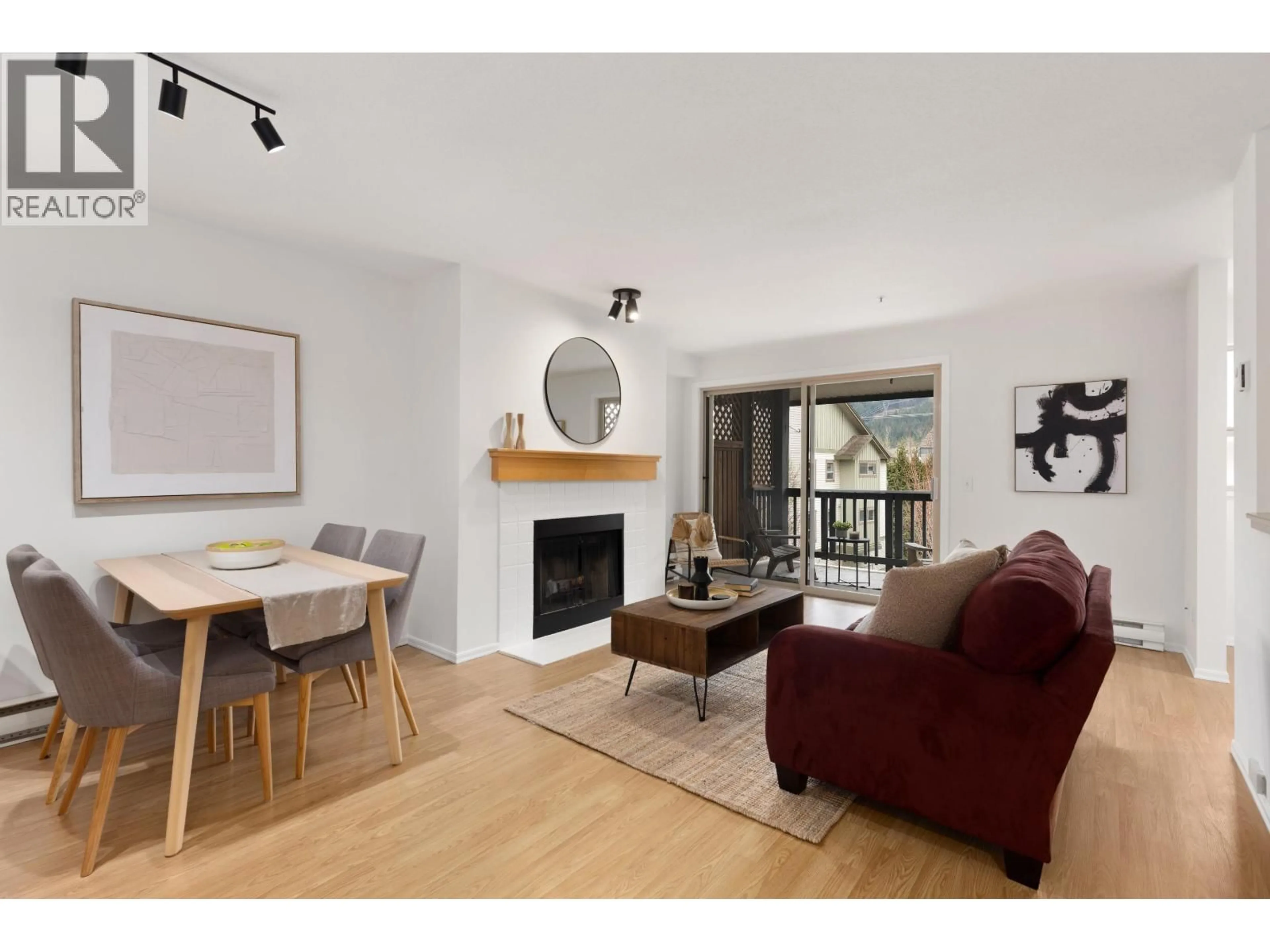 Living room with furniture, wood/laminate floor for 38 - 7410 FLINT STREET, Pemberton British Columbia V0N2L1