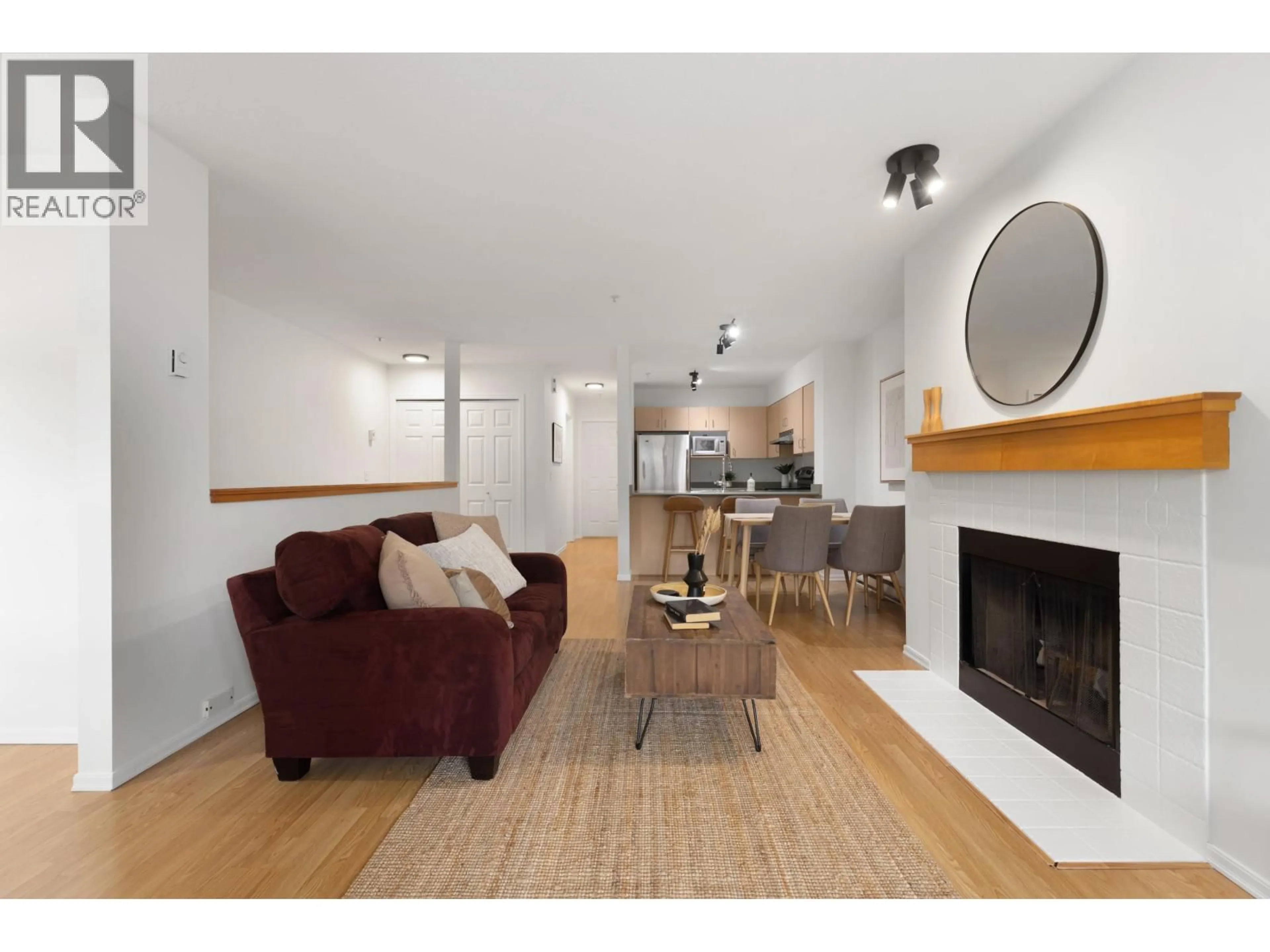 Living room with furniture, wood/laminate floor for 38 - 7410 FLINT STREET, Pemberton British Columbia V0N2L1