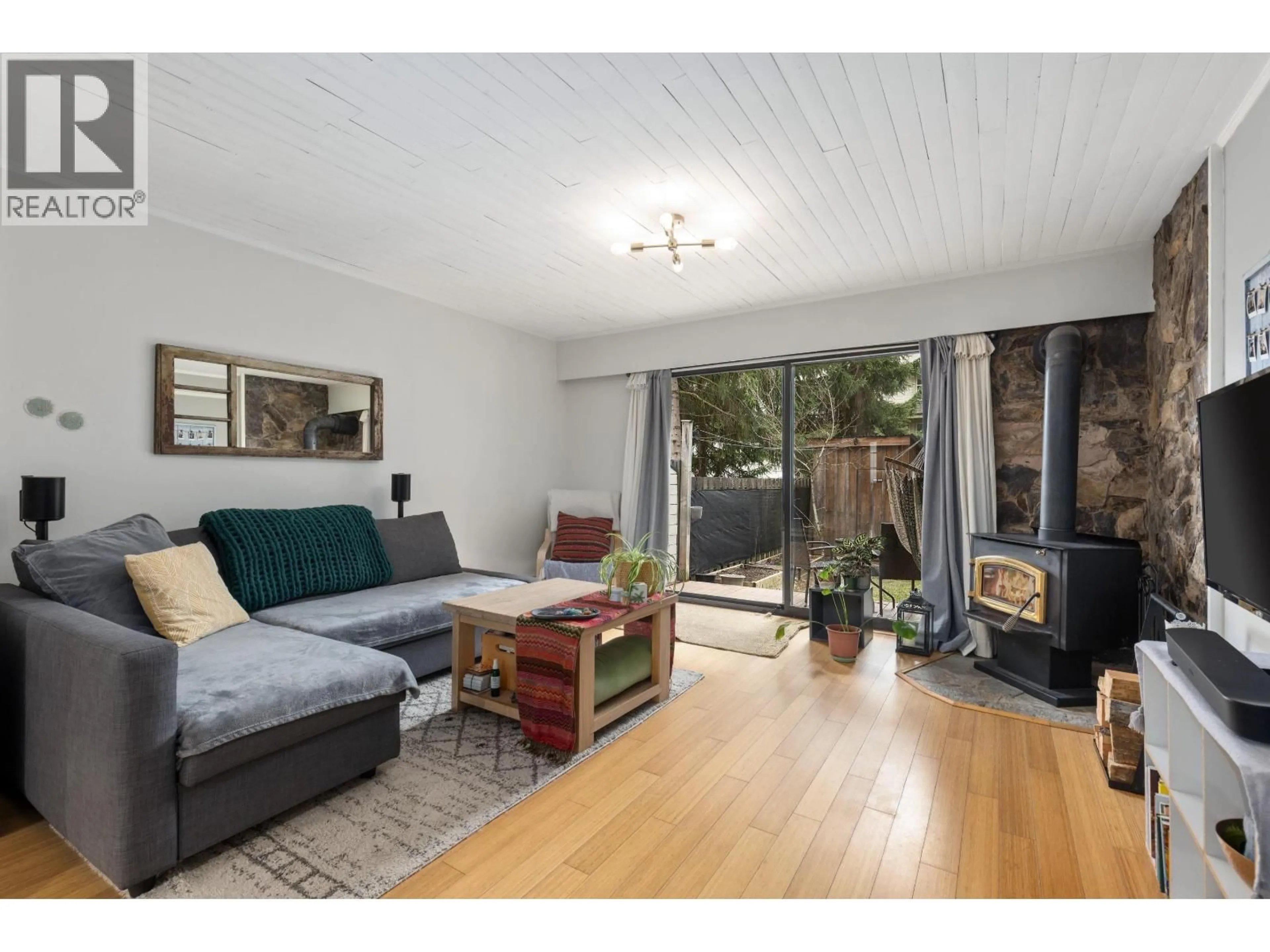 Living room with furniture, wood/laminate floor for 13 - 1470 LAUREL STREET, Pemberton British Columbia V0N2L1