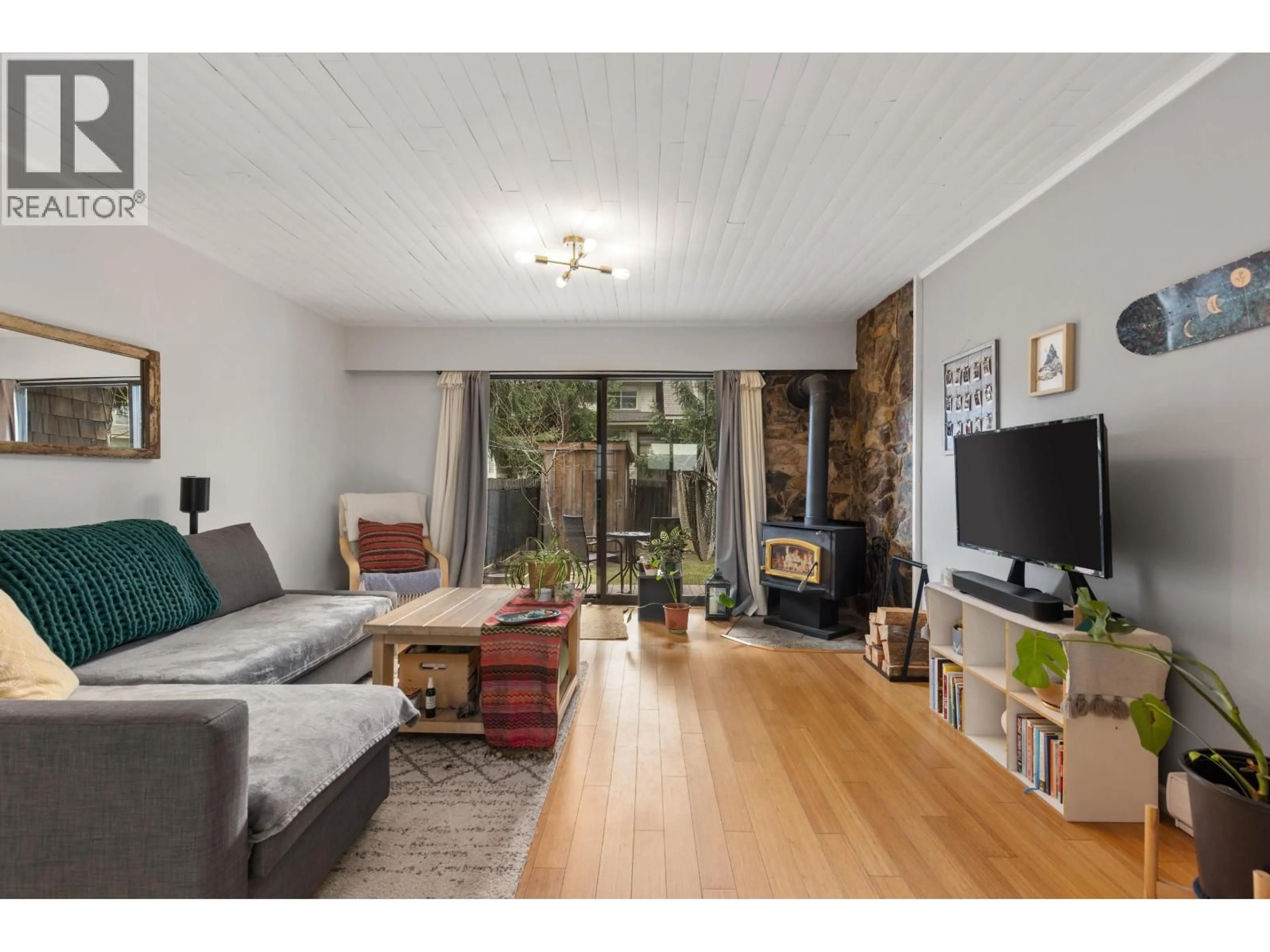 Living room with furniture, wood/laminate floor for 13 - 1470 LAUREL STREET, Pemberton British Columbia V0N2L1