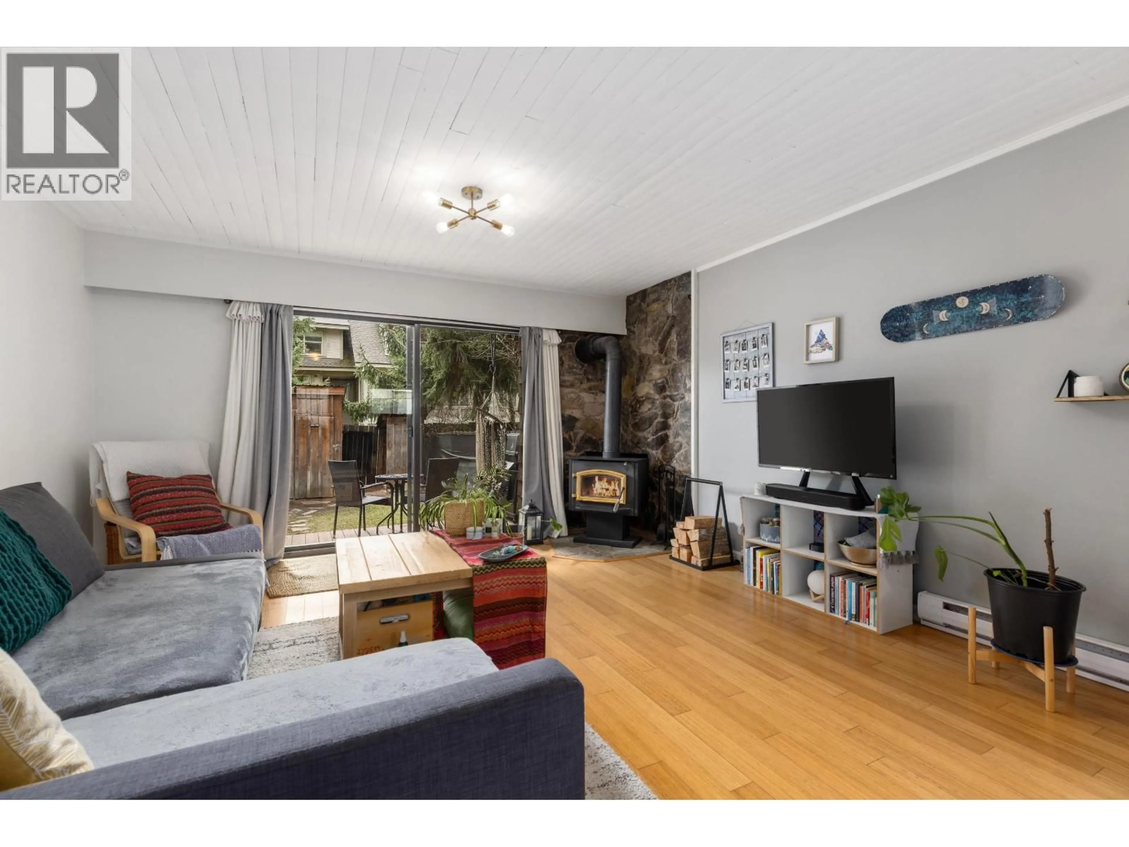 Living room with furniture, wood/laminate floor for 13 - 1470 LAUREL STREET, Pemberton British Columbia V0N2L1