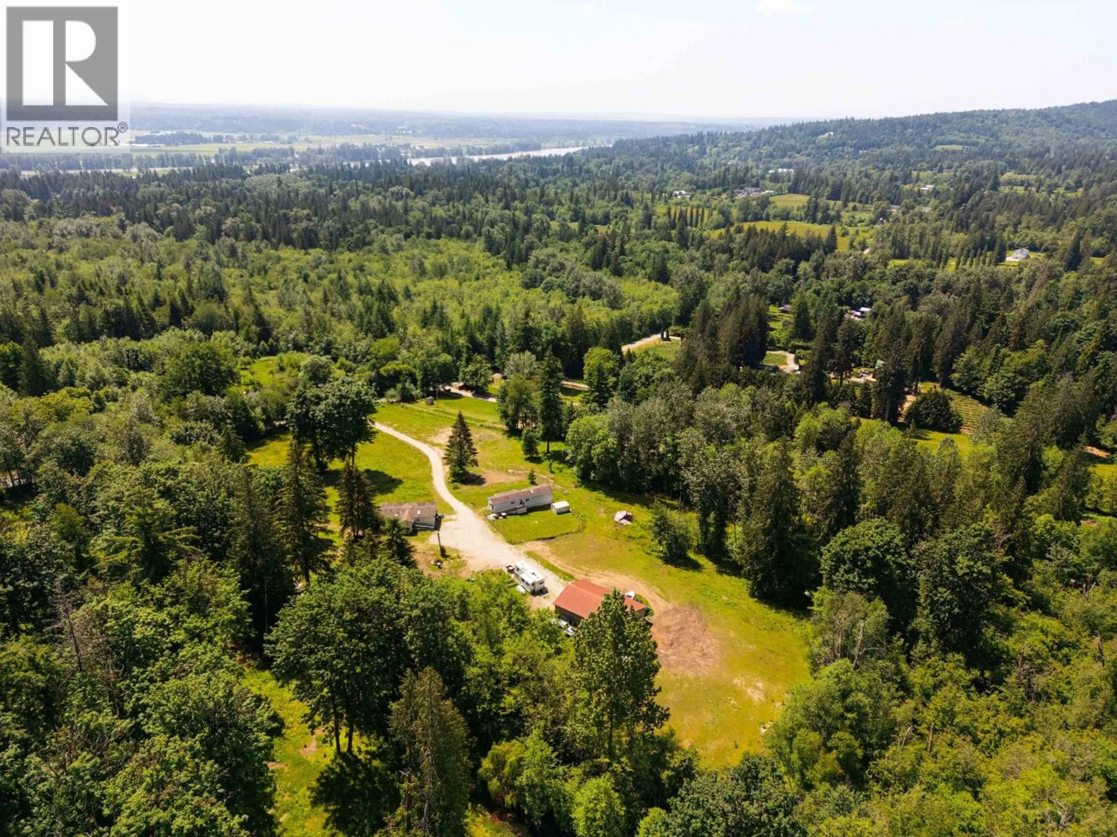 A pic from outside/outdoor area/front of a property/back of a property/a pic from drone, forest/trees view for 28555 104 AVENUE, Maple Ridge British Columbia V2W1L5