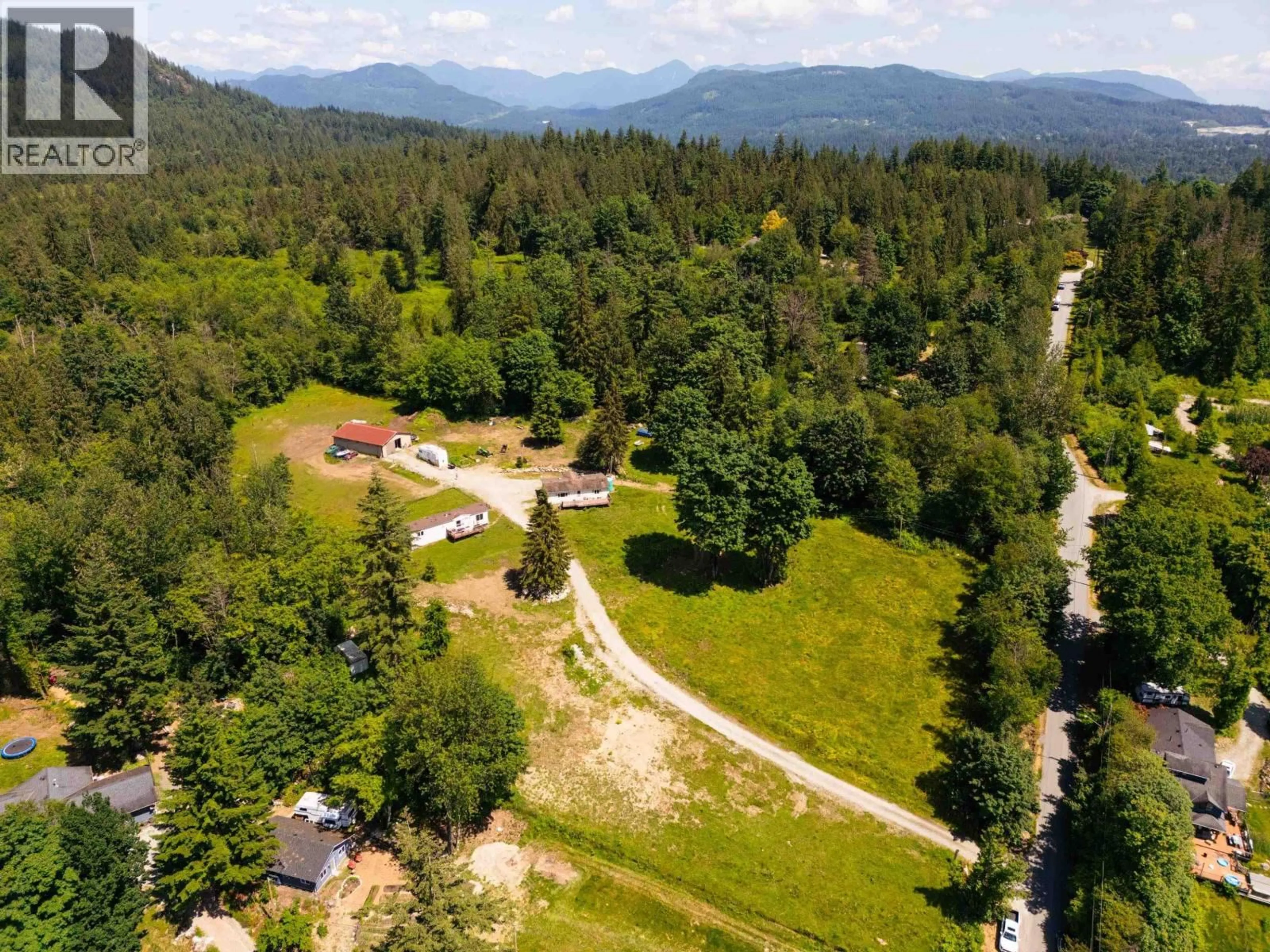 A pic from outside/outdoor area/front of a property/back of a property/a pic from drone, mountain view for 28555 104 AVENUE, Maple Ridge British Columbia V2W1L5