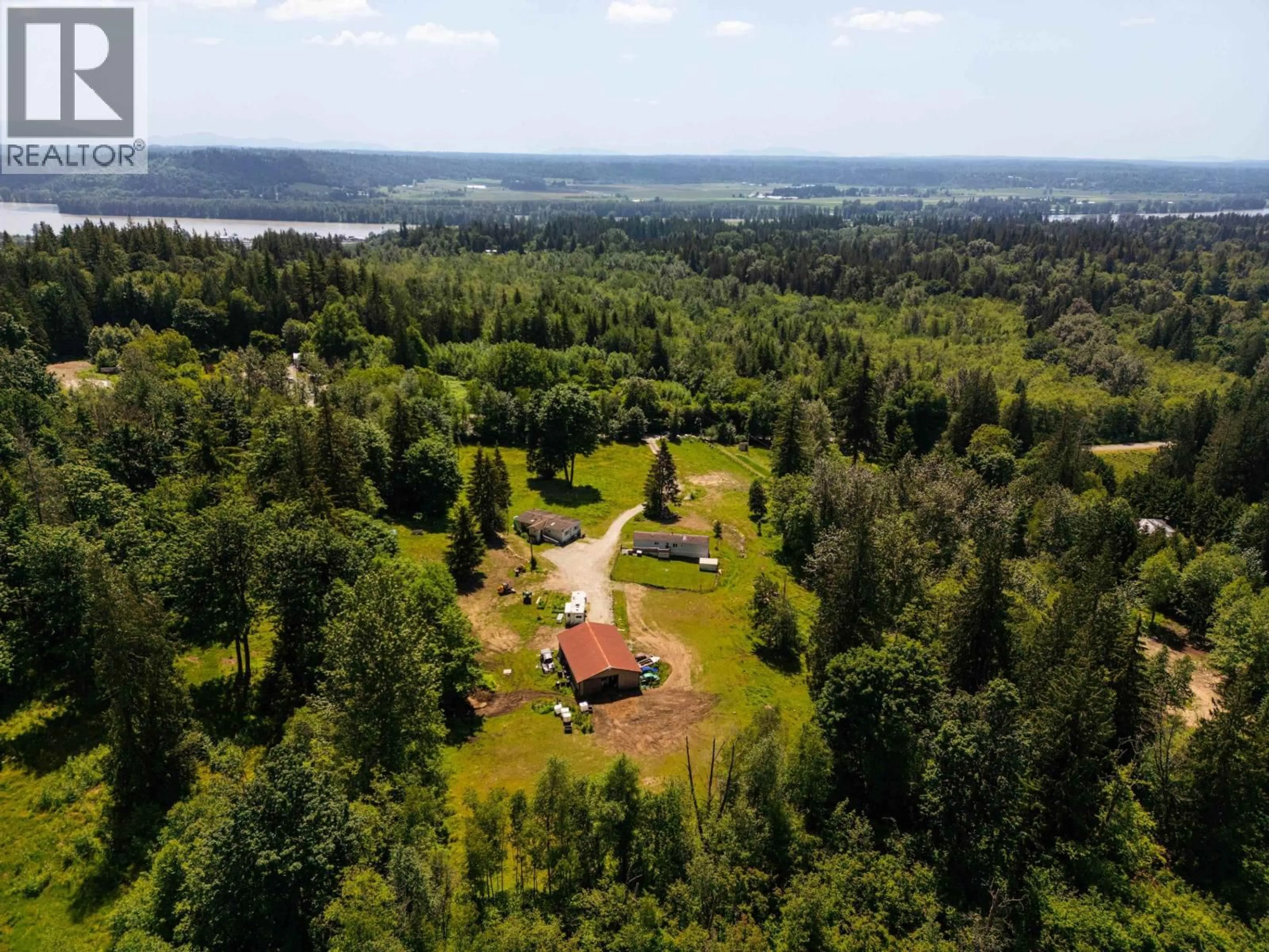 A pic from outside/outdoor area/front of a property/back of a property/a pic from drone, forest/trees view for 28555 104 AVENUE, Maple Ridge British Columbia V2W1L5