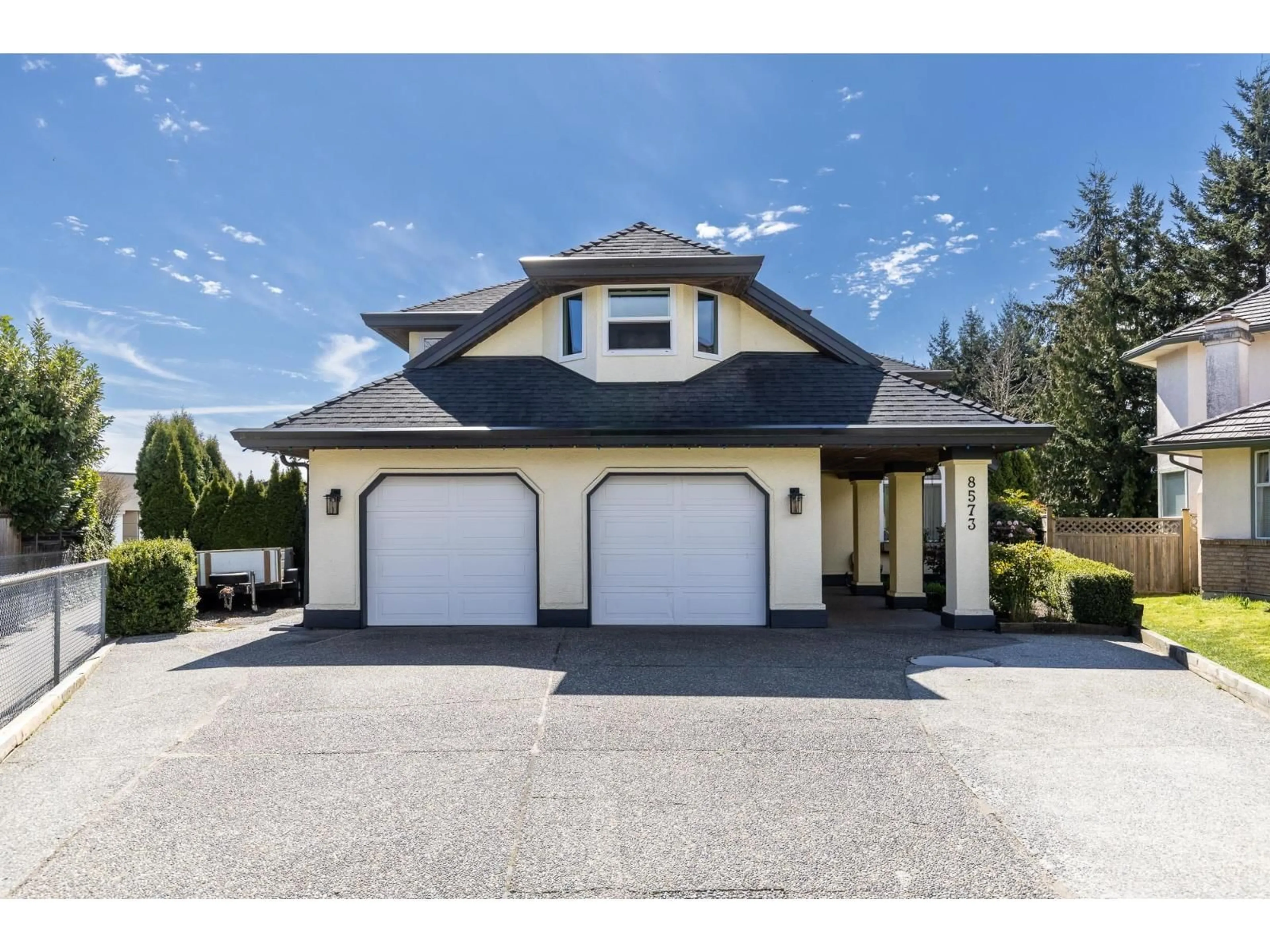 Home with vinyl exterior material, street for 8573 142 STREET, Surrey British Columbia V3W0S3