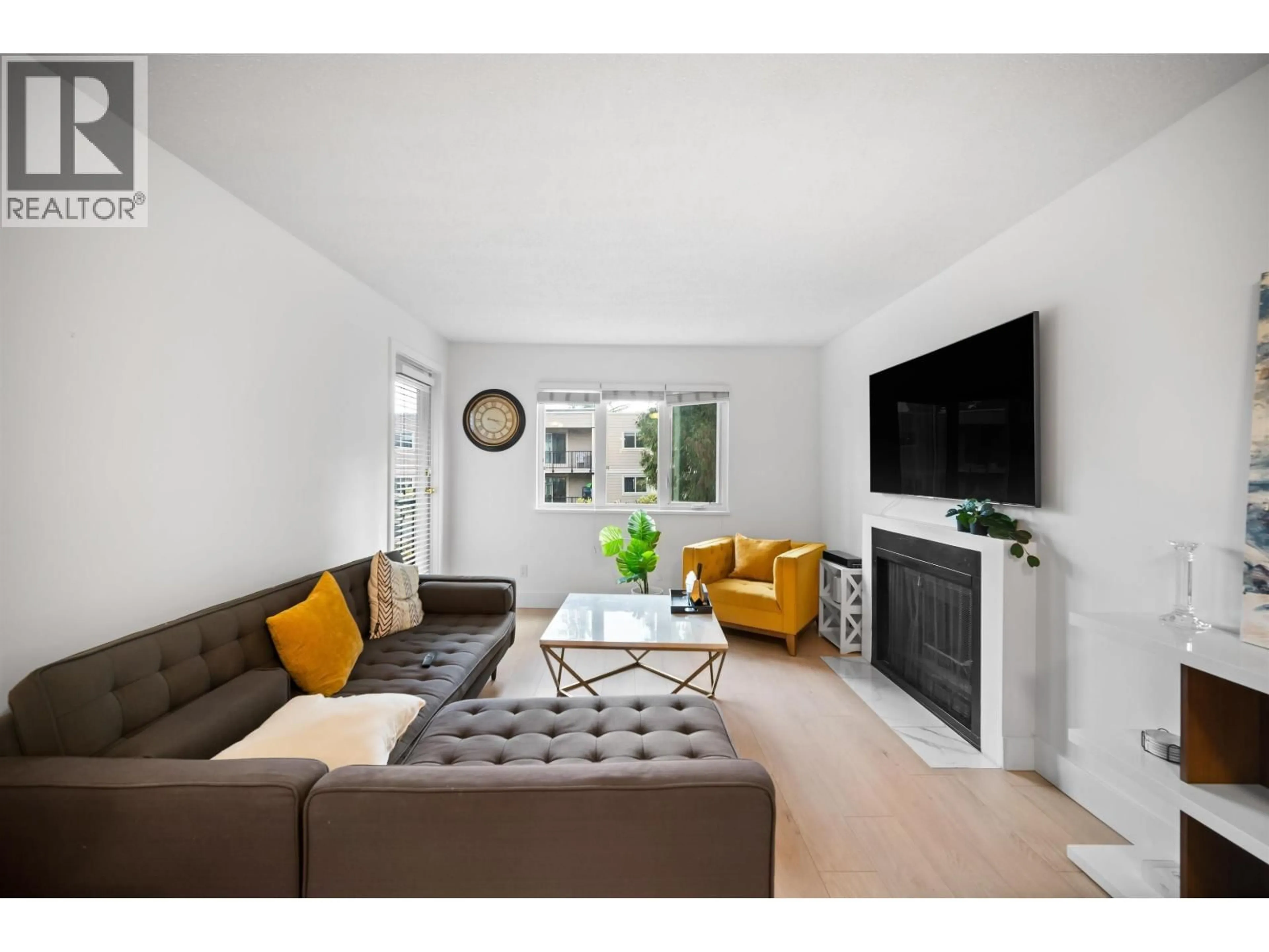 Living room with furniture, unknown for 203 - 1122 KING ALBERT AVENUE, Coquitlam British Columbia V3J1X7