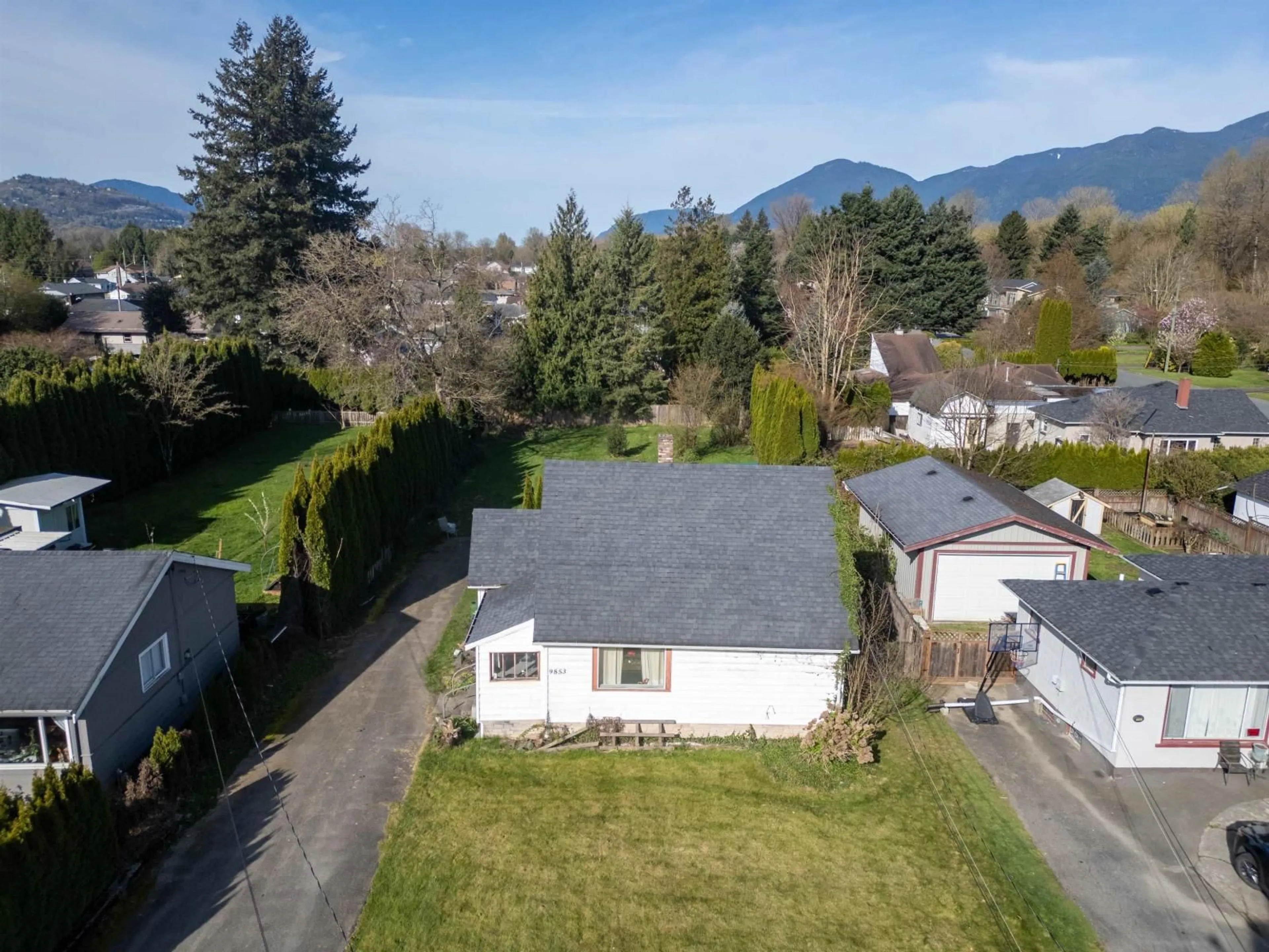 A pic from outside/outdoor area/front of a property/back of a property/a pic from drone, mountain view for 9853 YOUNG ROAD, Chilliwack British Columbia V2P4T8