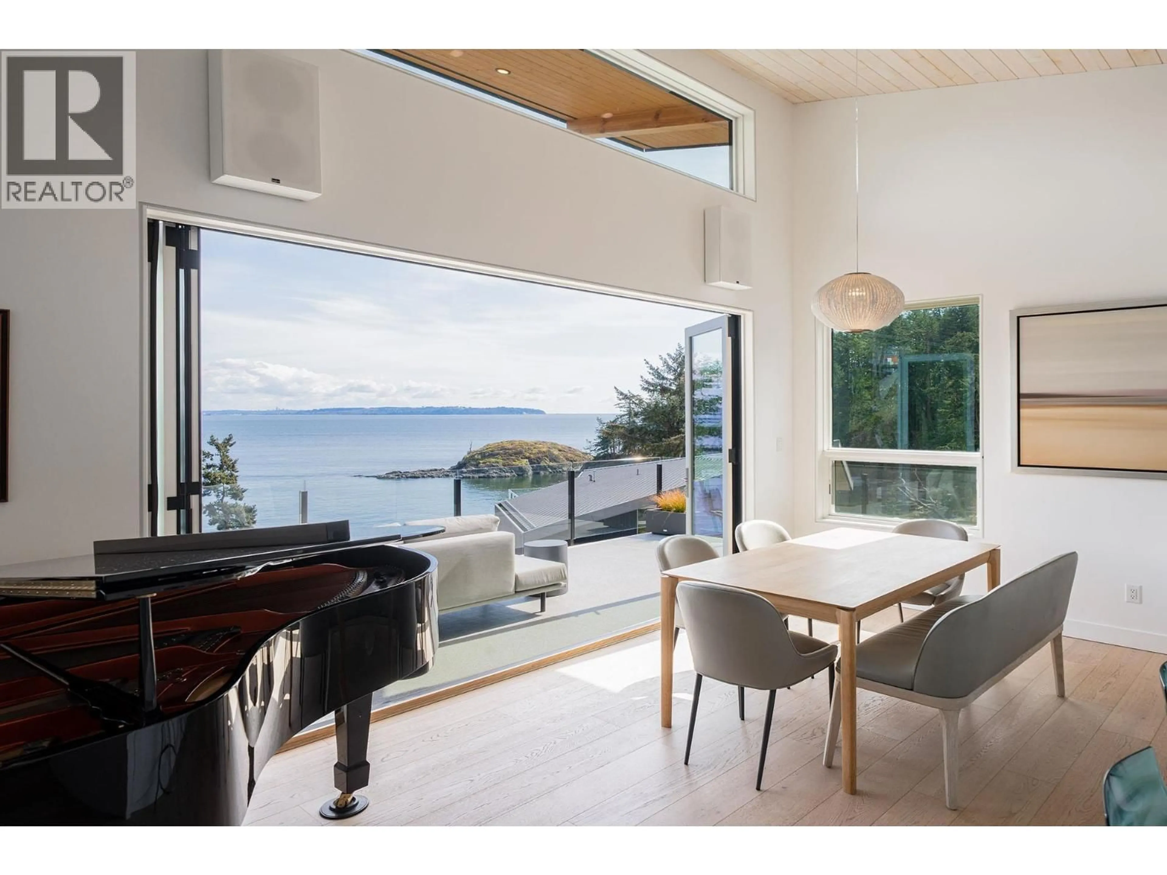 Dining room, wood/laminate floor for 242 SHORE LANE, Bowen Island British Columbia V0N1G2
