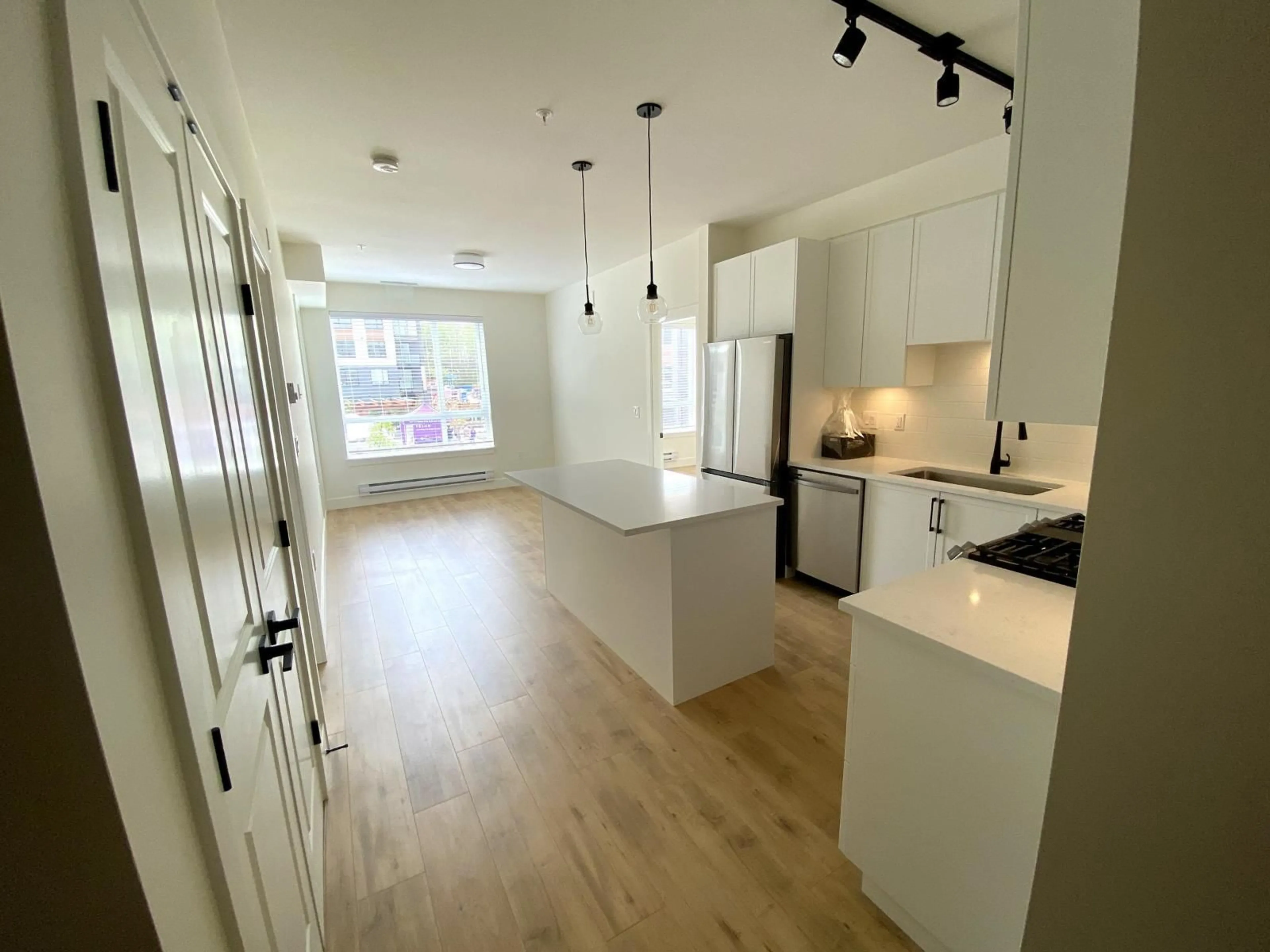 Open concept kitchen, unknown for 206 - 19935 75A AVENUE, Langley British Columbia V2Y4L6