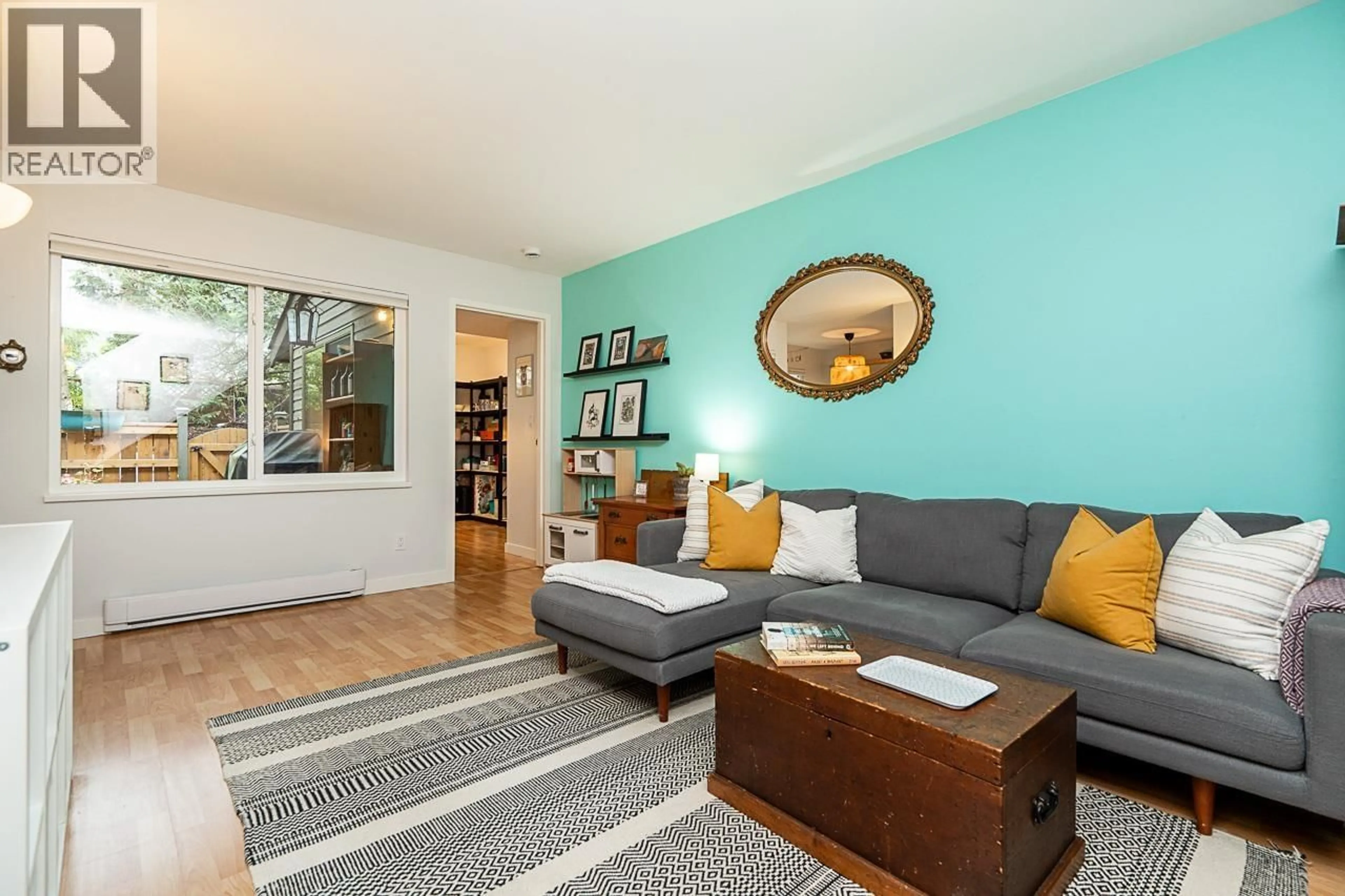 Living room with furniture, wood/laminate floor for 3416 NAIRN AVENUE, Vancouver British Columbia V5S4B5