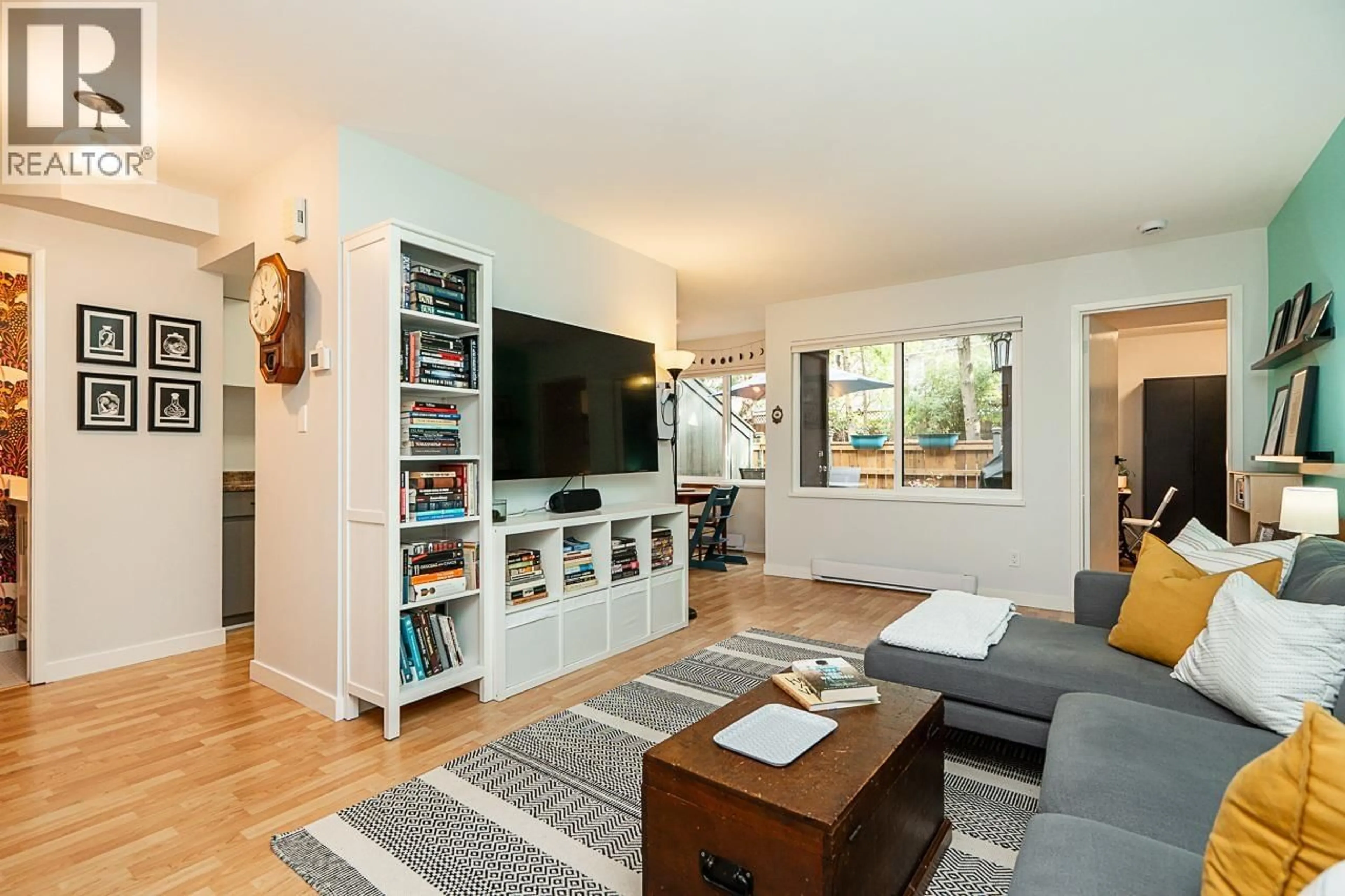 Living room with furniture, wood/laminate floor for 3416 NAIRN AVENUE, Vancouver British Columbia V5S4B5