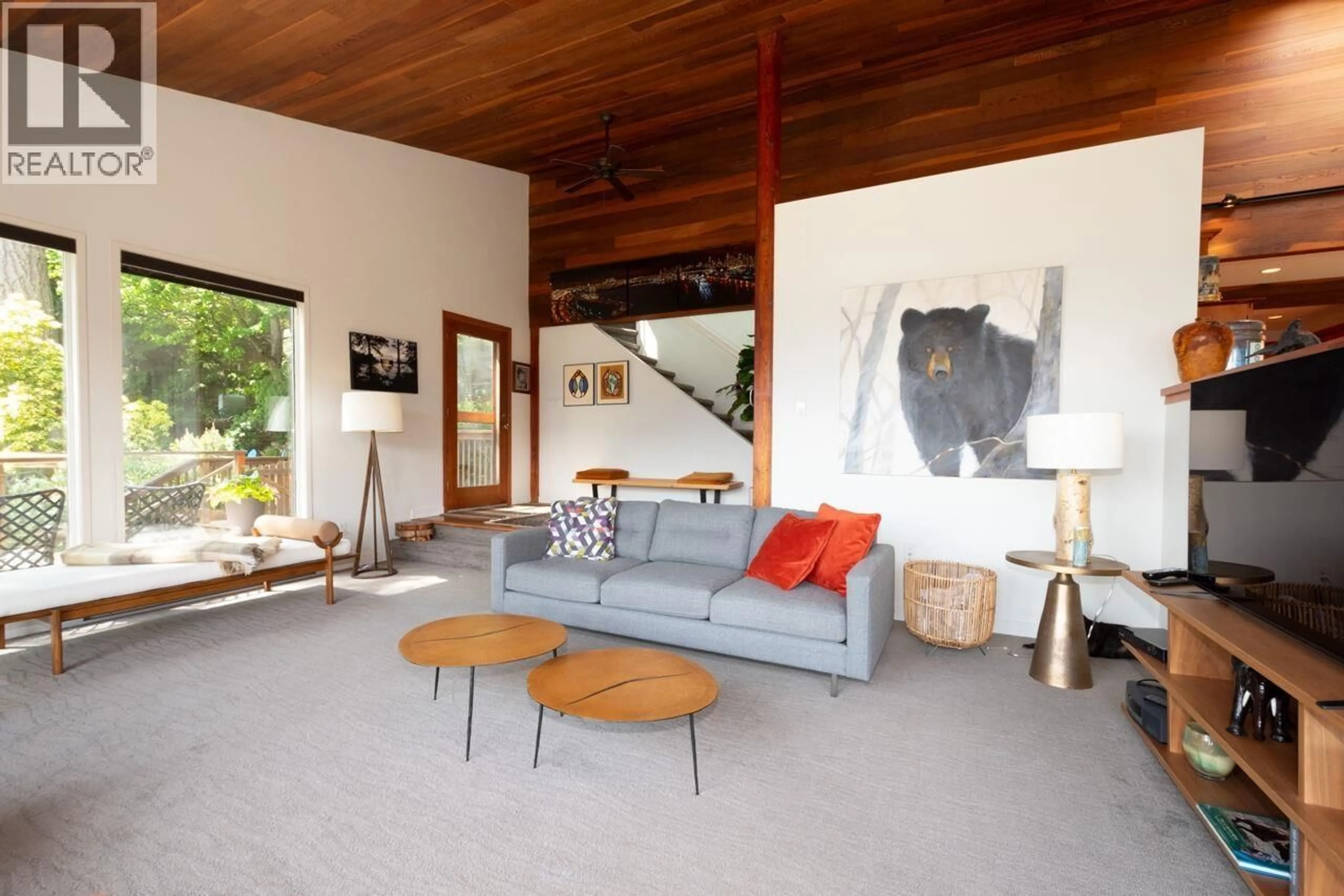 Living room with furniture, cement floor for 896 TAYLOR ROAD, Bowen Island British Columbia V0N1G1