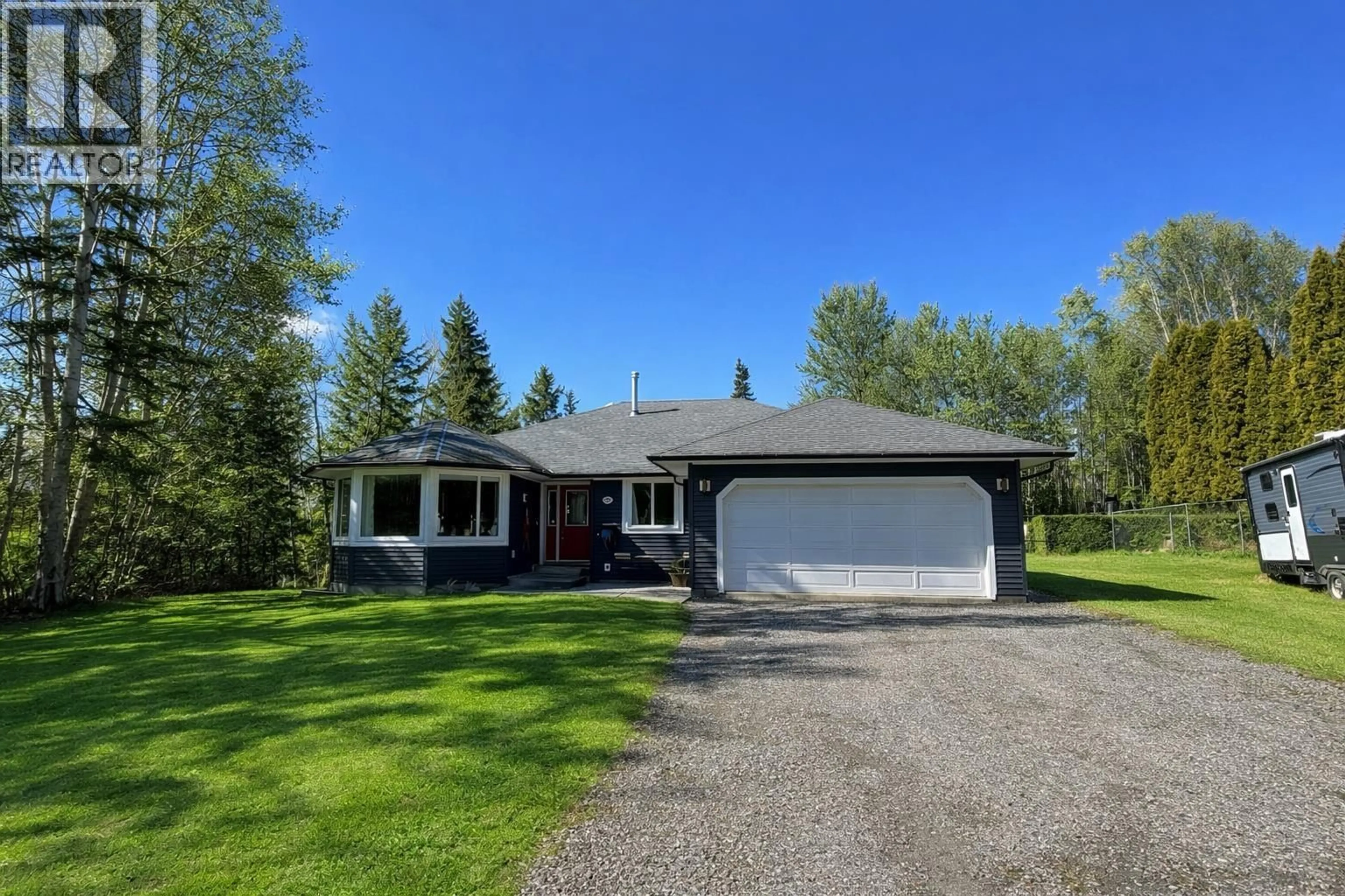 A pic from outside/outdoor area/front of a property/back of a property/a pic from drone, street for 227 FIEGE ROAD, Quesnel British Columbia V2J5T6