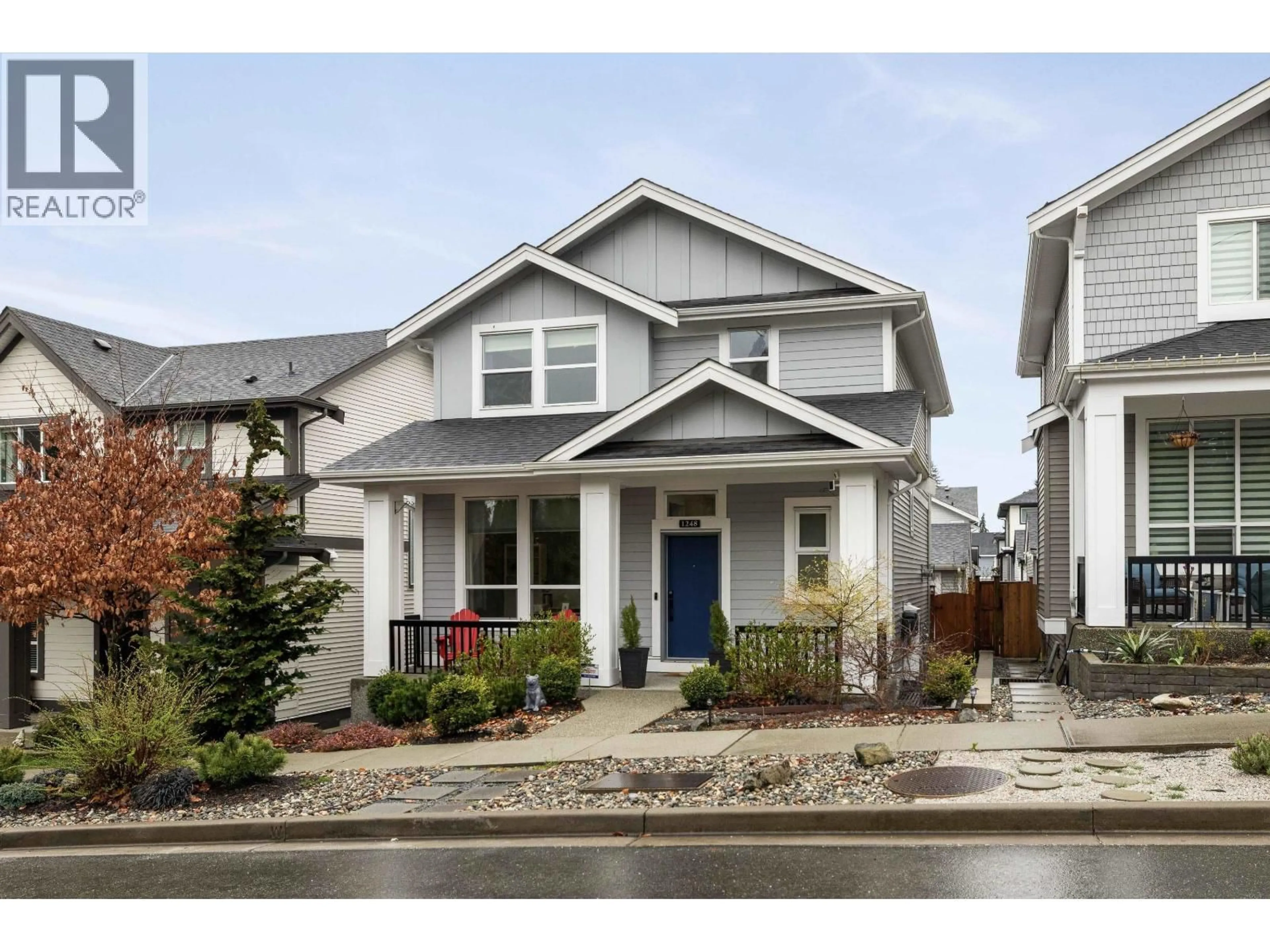 Home with vinyl exterior material, street for 1248 MOUNCE DRIVE, Coquitlam British Columbia V3B2W7