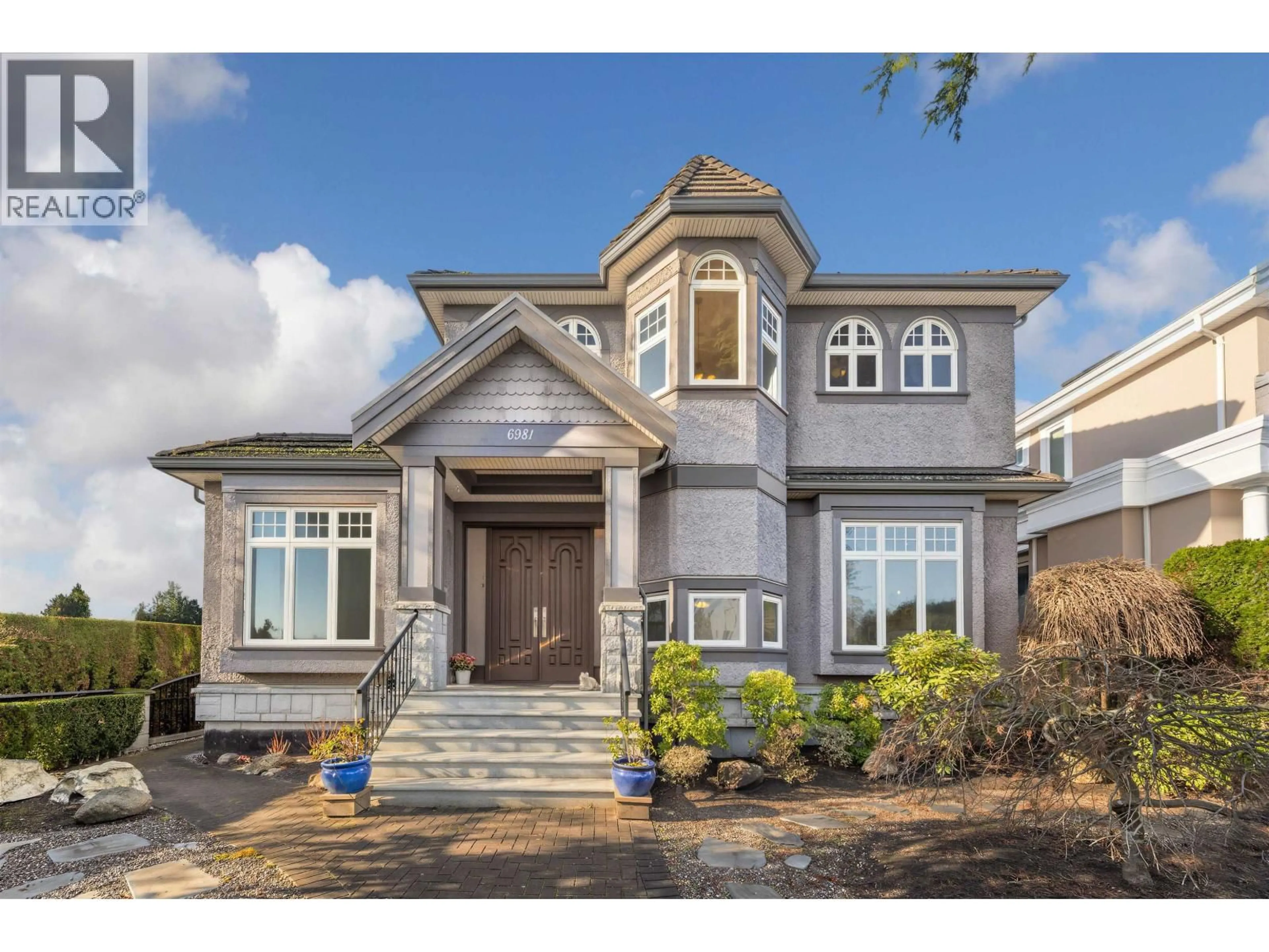 Home with vinyl exterior material, street for 6981 LAUREL STREET, Vancouver British Columbia V6P3T6