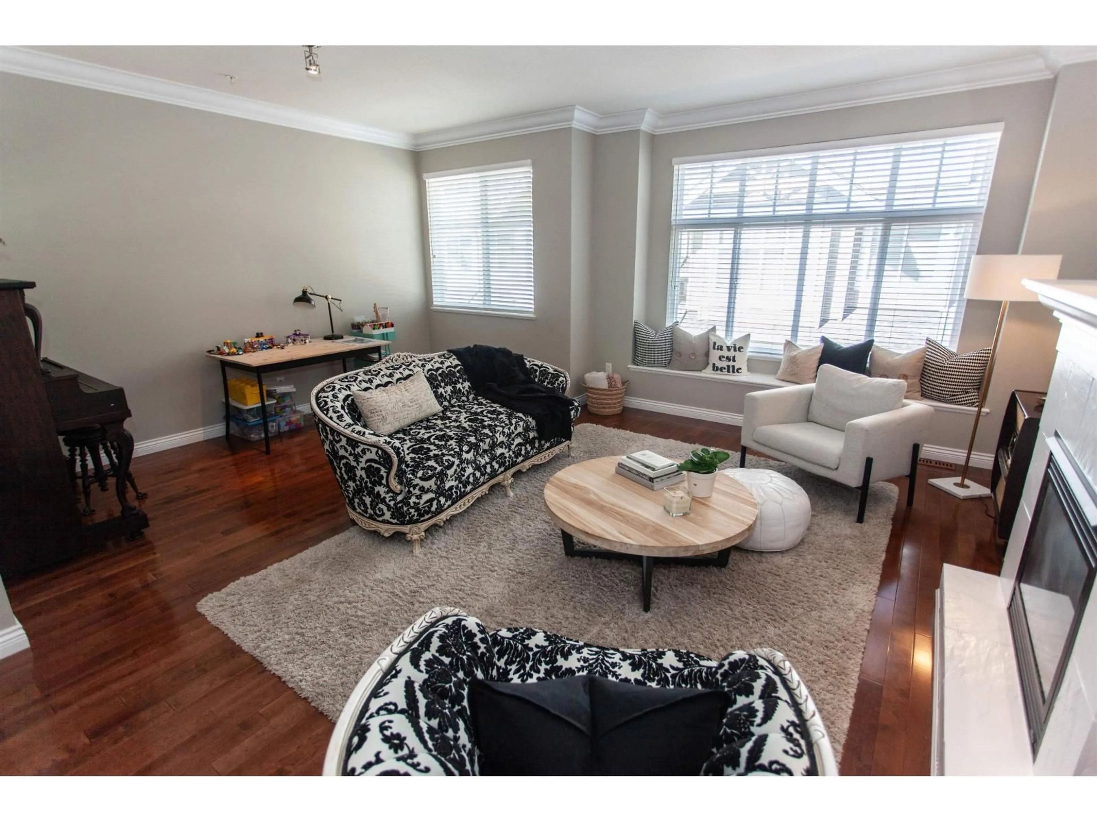 Living room with furniture, wood/laminate floor for 42 - 21704 96 AVENUE, Langley British Columbia V1M0A8