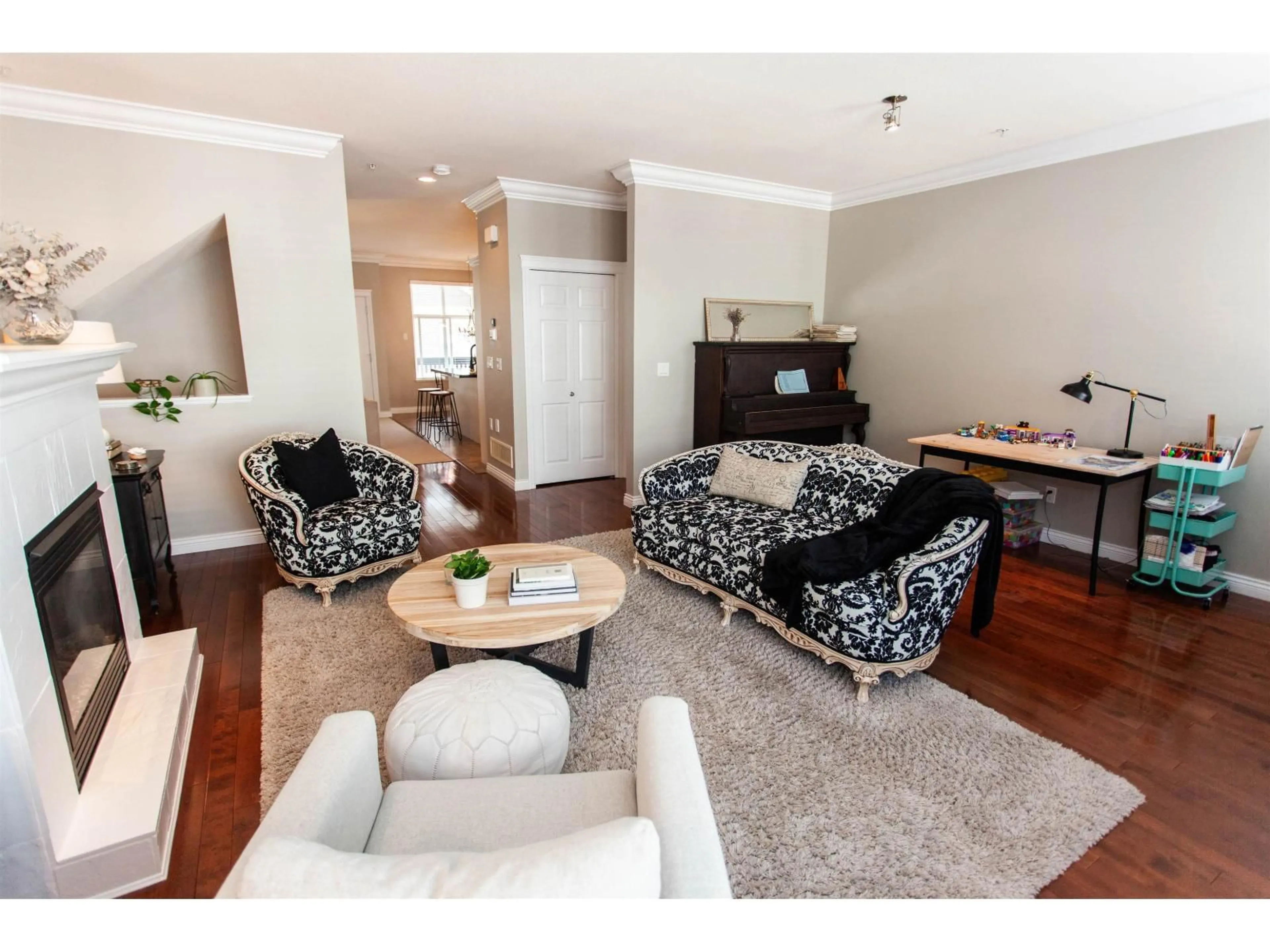 Living room with furniture, wood/laminate floor for 42 - 21704 96 AVENUE, Langley British Columbia V1M0A8