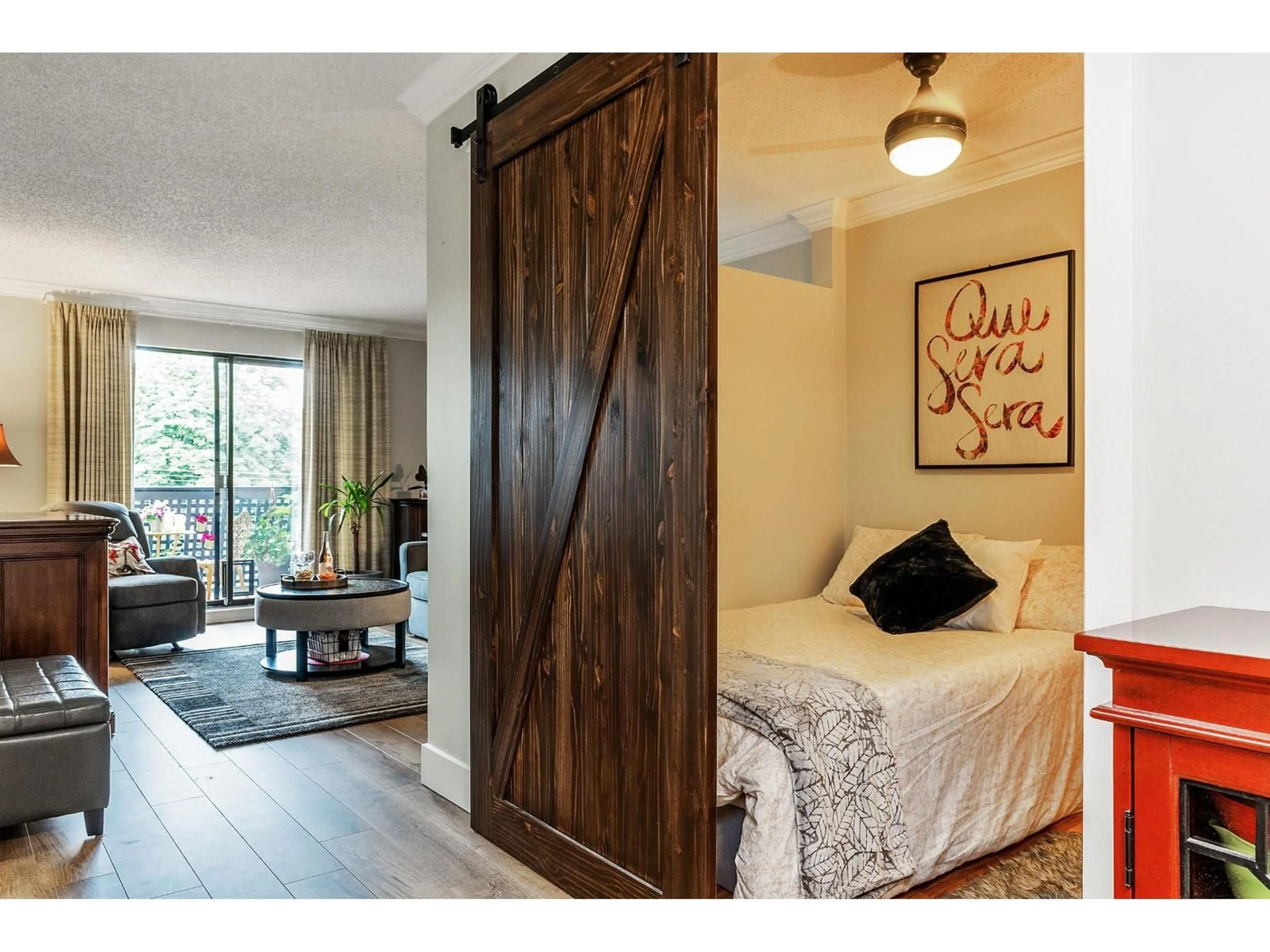 Bedroom with bed, wood/laminate floor for 203 - 17661 58A AVENUE, Surrey British Columbia V3S1N4