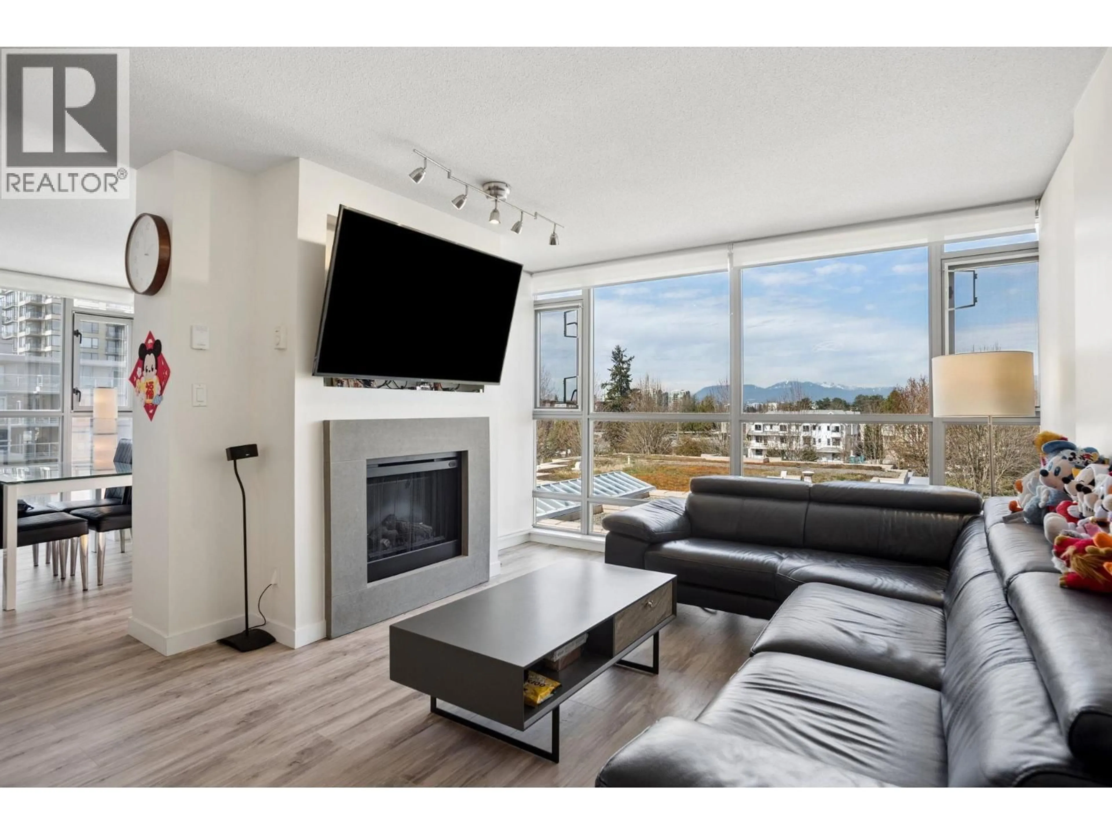 Living room with furniture, wood/laminate floor for 519 - 9373 HEMLOCK DRIVE, Richmond British Columbia V6Y0A9