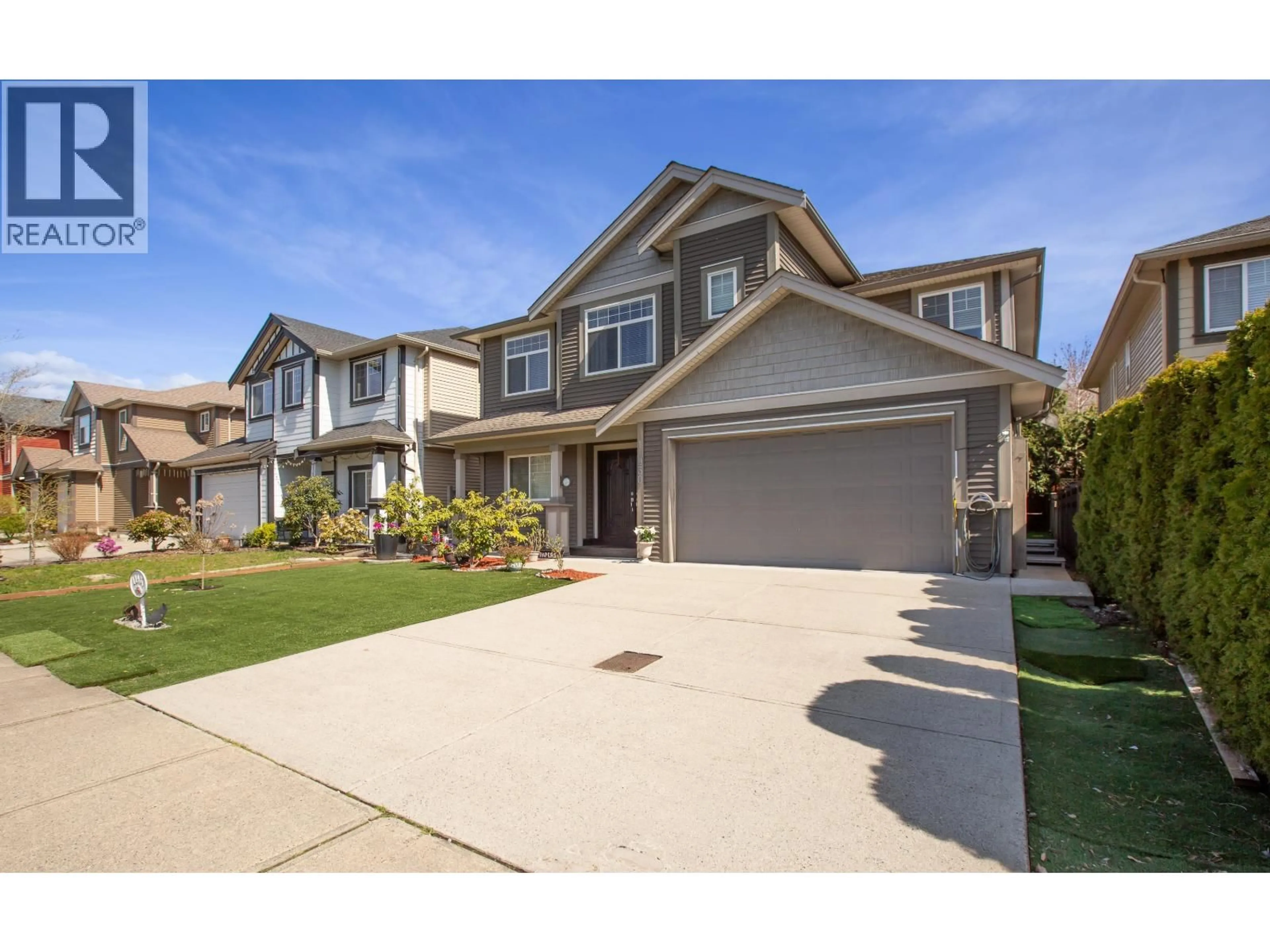 Home with vinyl exterior material, street for 11930 239TH STREET, Maple Ridge British Columbia V4R1W4