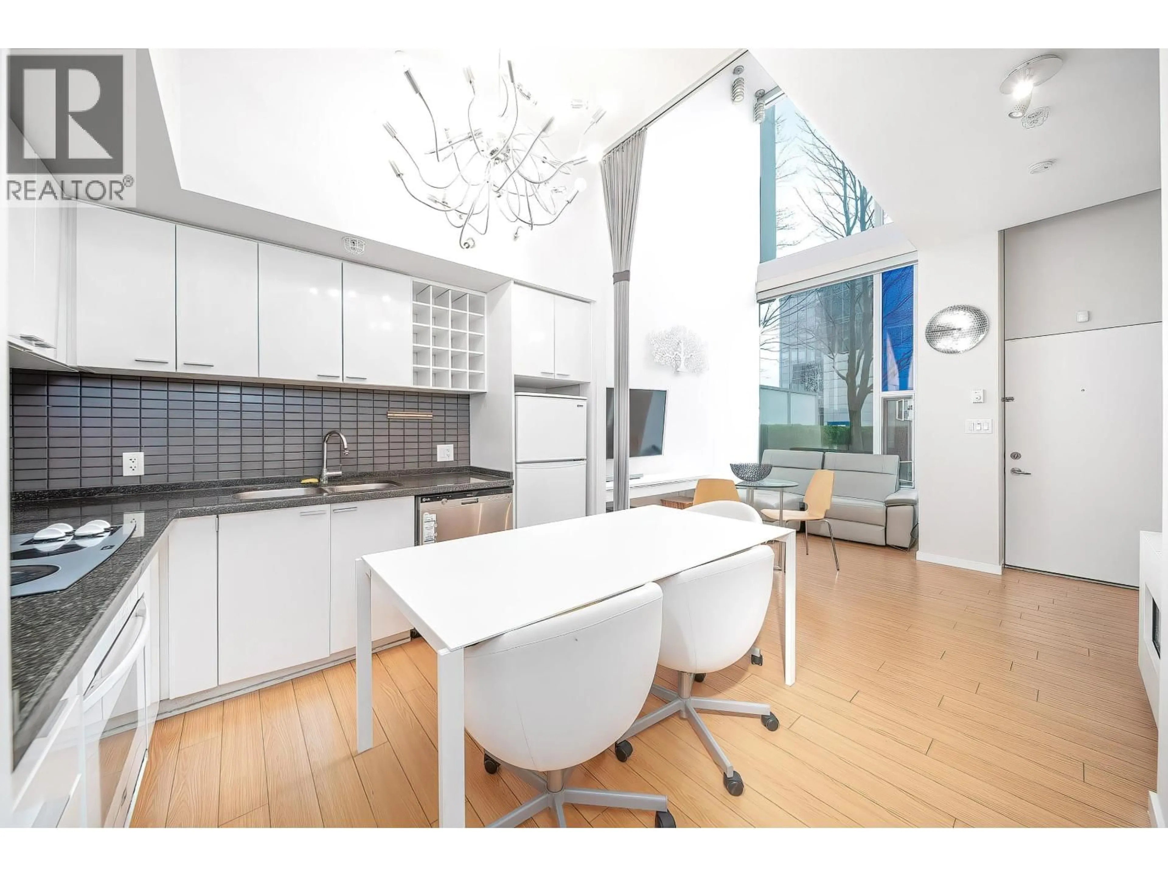 Open concept kitchen, unknown for 119 REGIMENT SQUARE, Vancouver British Columbia V6B1X5