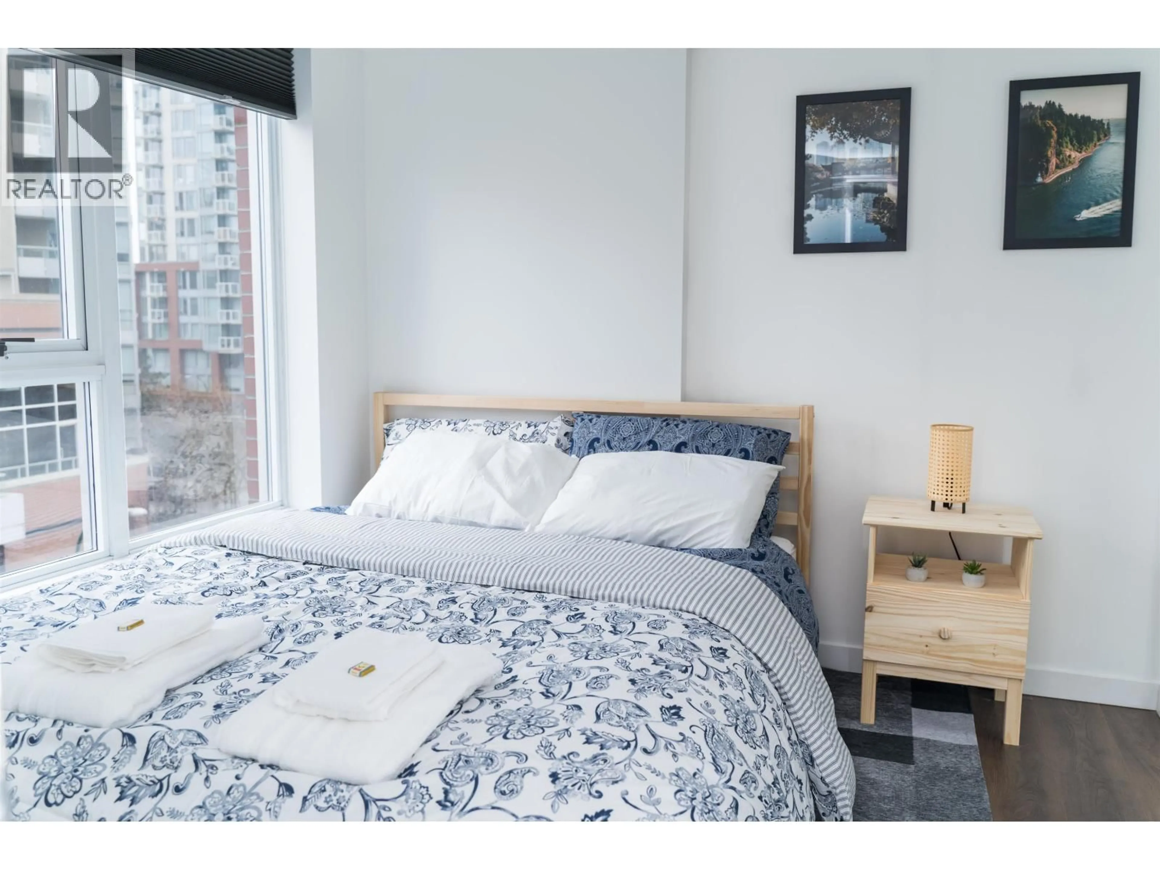 Bedroom with bed, wood/laminate floor for 612 - 618 ABBOTT STREET, Vancouver British Columbia V6B0B9
