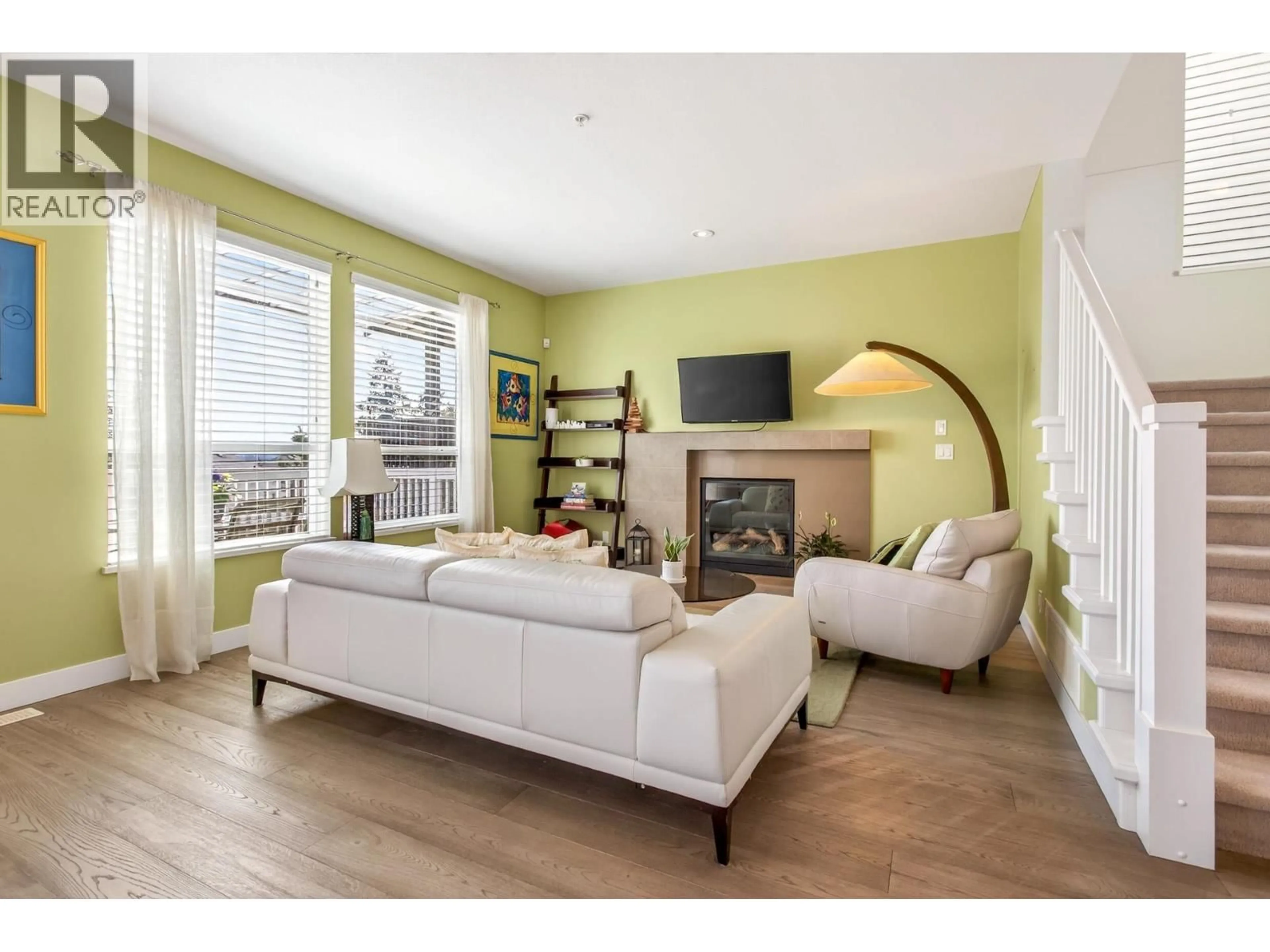 Living room with furniture, wood/laminate floor for 1280 CITADEL DRIVE, Port Coquitlam British Columbia V3C5X4