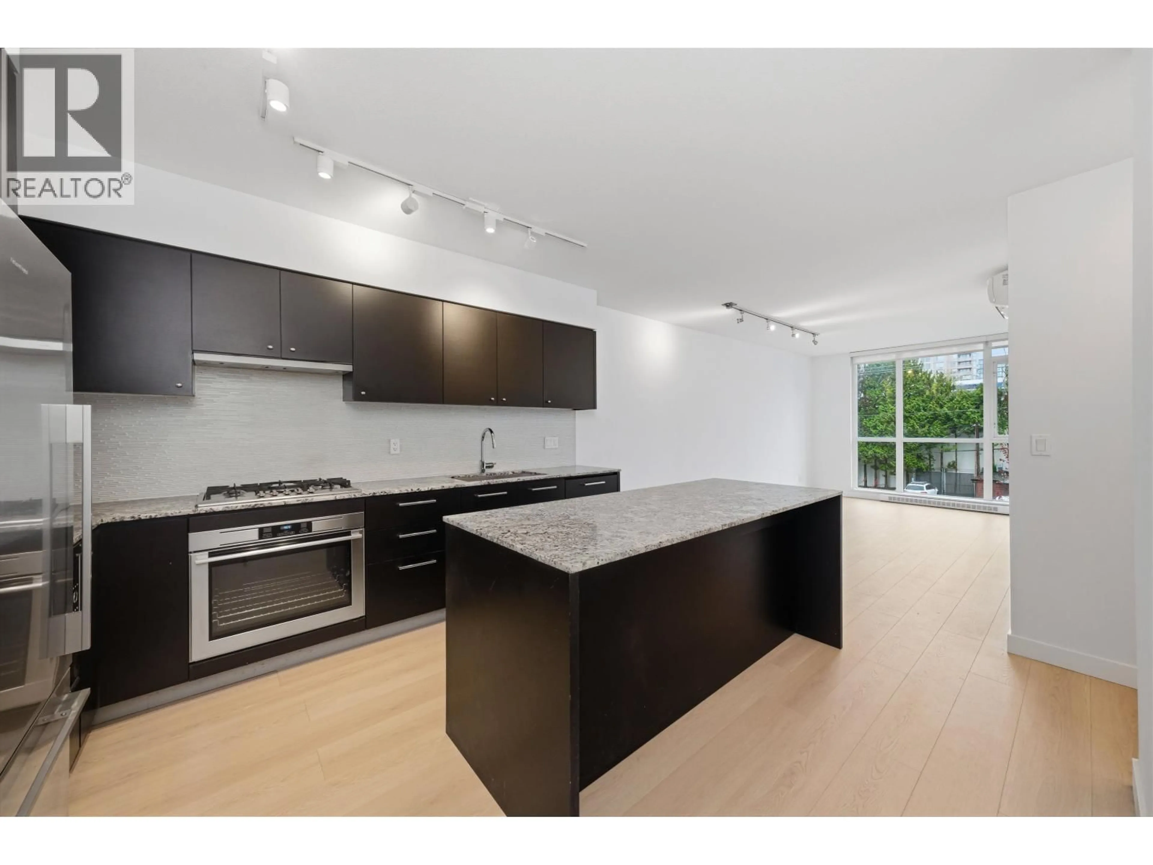 Open concept kitchen, unknown for 307 - 6180 COONEY ROAD, Richmond British Columbia V6Y0H2