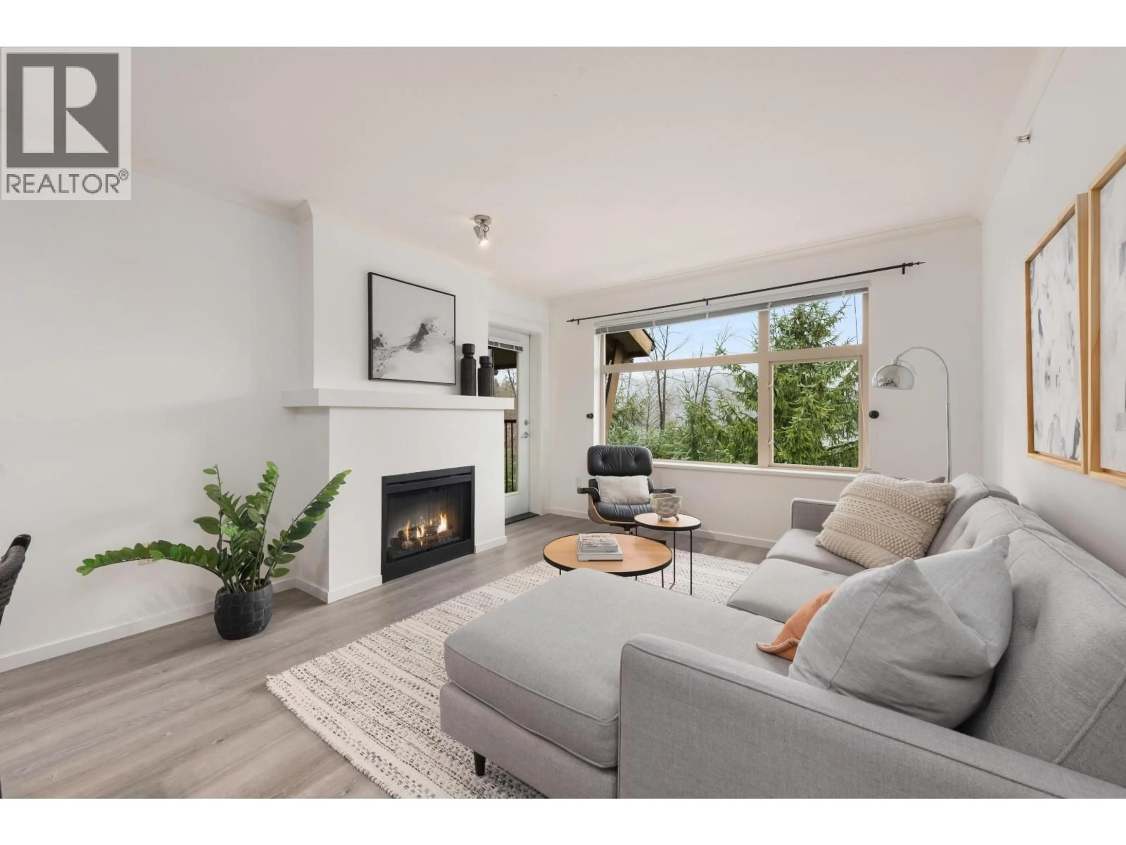 Living room with furniture, unknown for 401 - 300 KLAHANIE DRIVE, Port Moody British Columbia V3H5K8