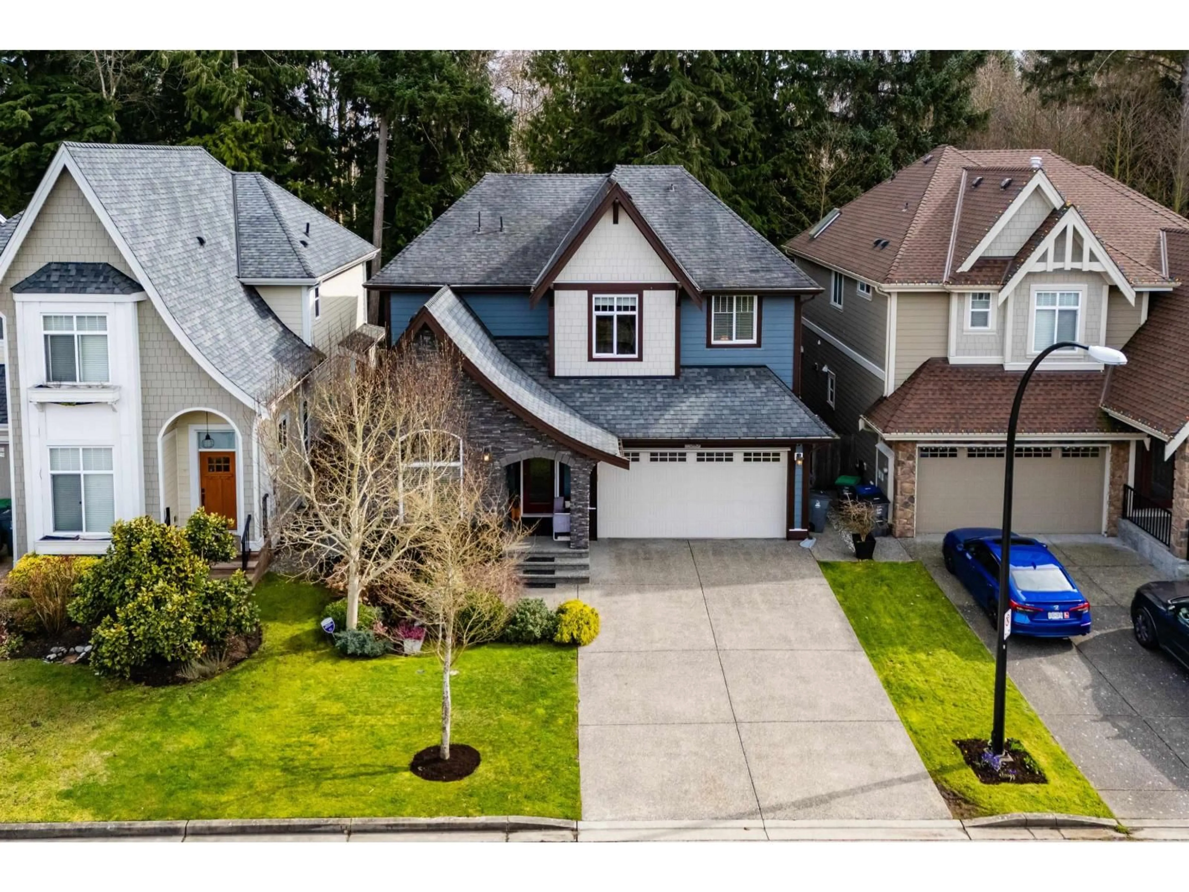 A pic from outside/outdoor area/front of a property/back of a property/a pic from drone, street for 310 171A STREET, Surrey British Columbia V3Z9P5