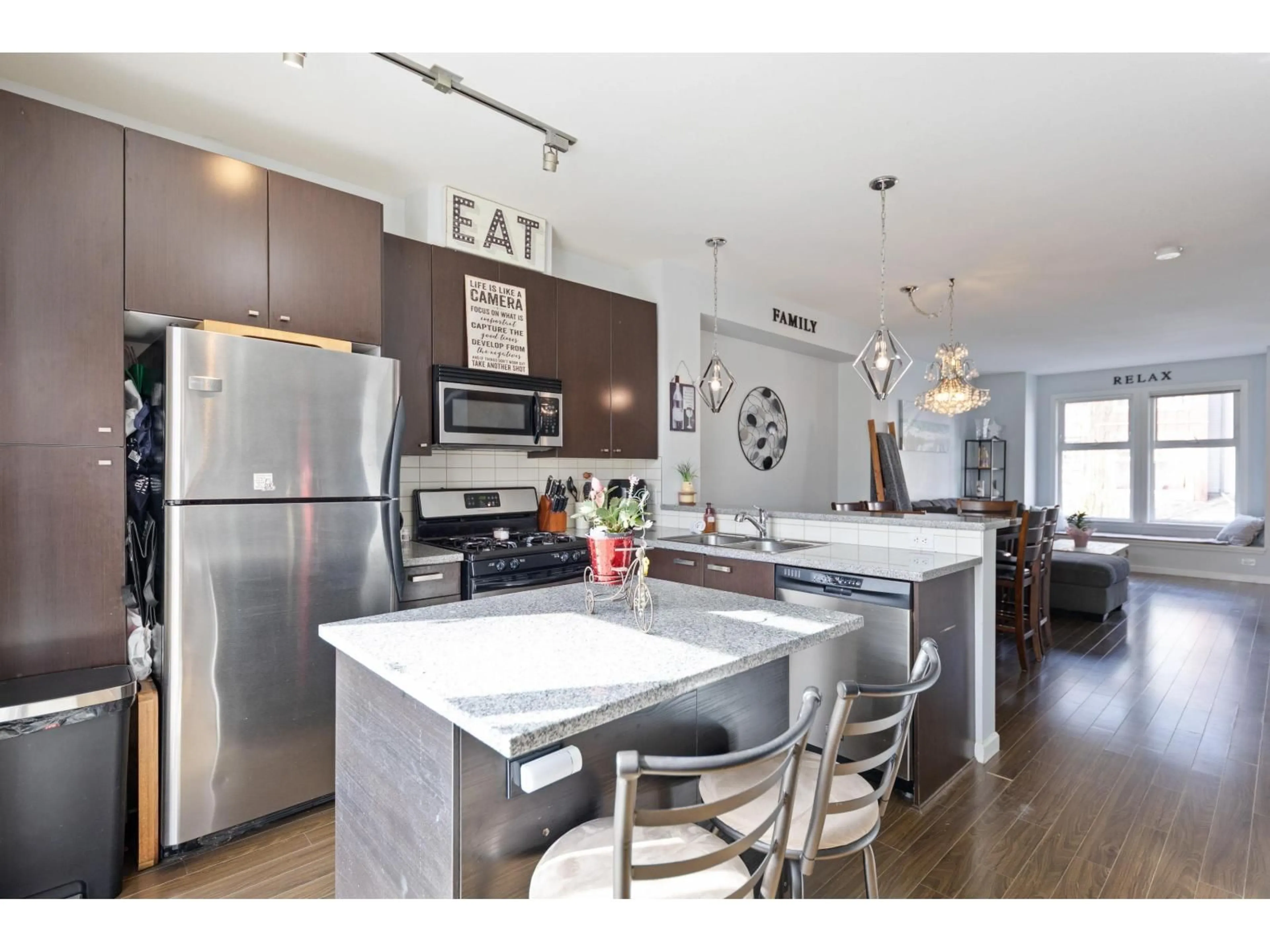 Open concept kitchen, wood/laminate floor for 96 - 18777 68A AVENUE, Surrey British Columbia V4N0Z7
