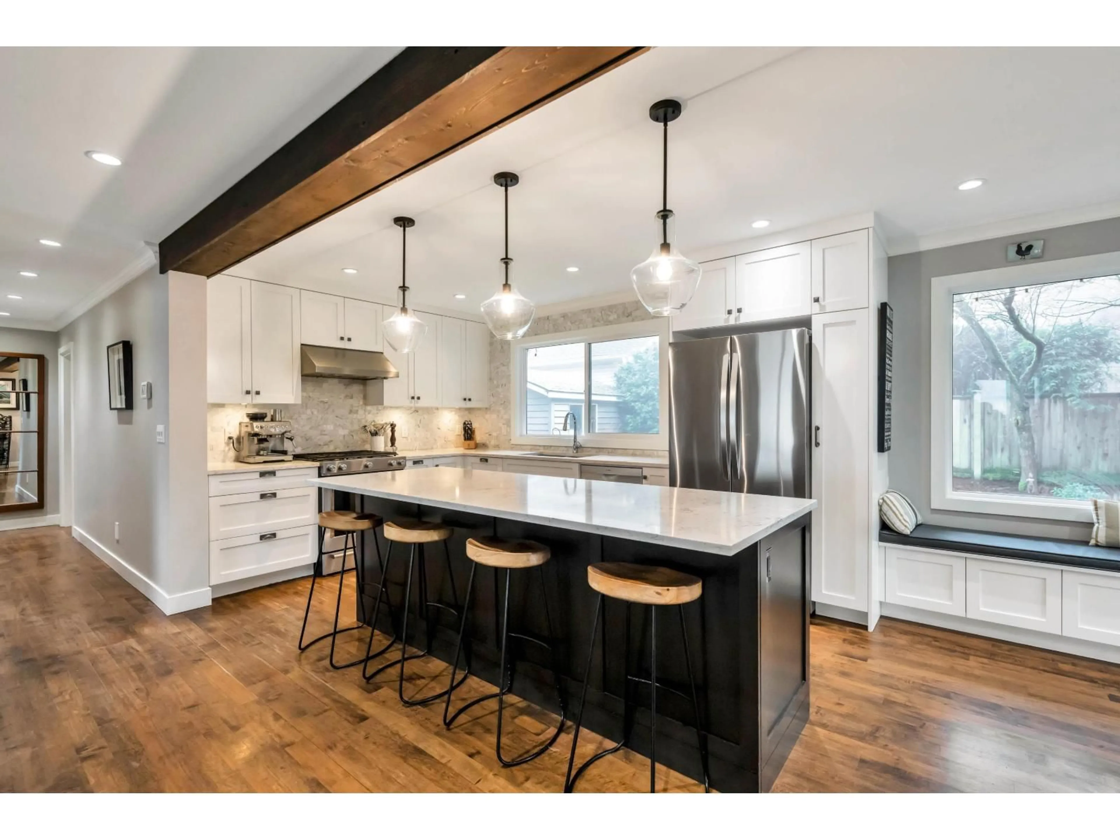 Open concept kitchen, wood/laminate floor for 2434 127 STREET, Surrey British Columbia V4A8H4