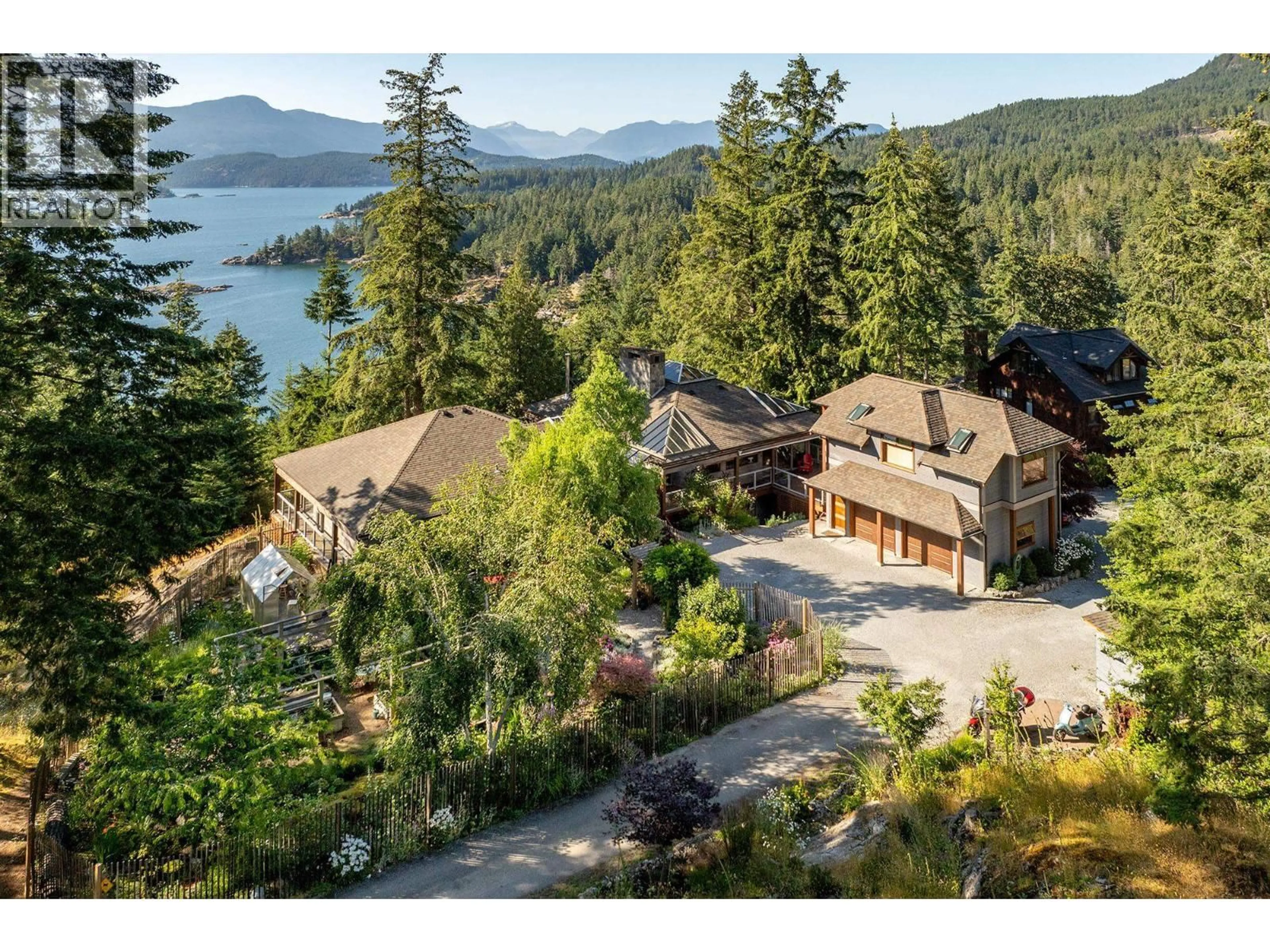 A pic from outside/outdoor area/front of a property/back of a property/a pic from drone, water/lake/river/ocean view for 1675 WHITESAILS DRIVE, Bowen Island British Columbia V0N1G2