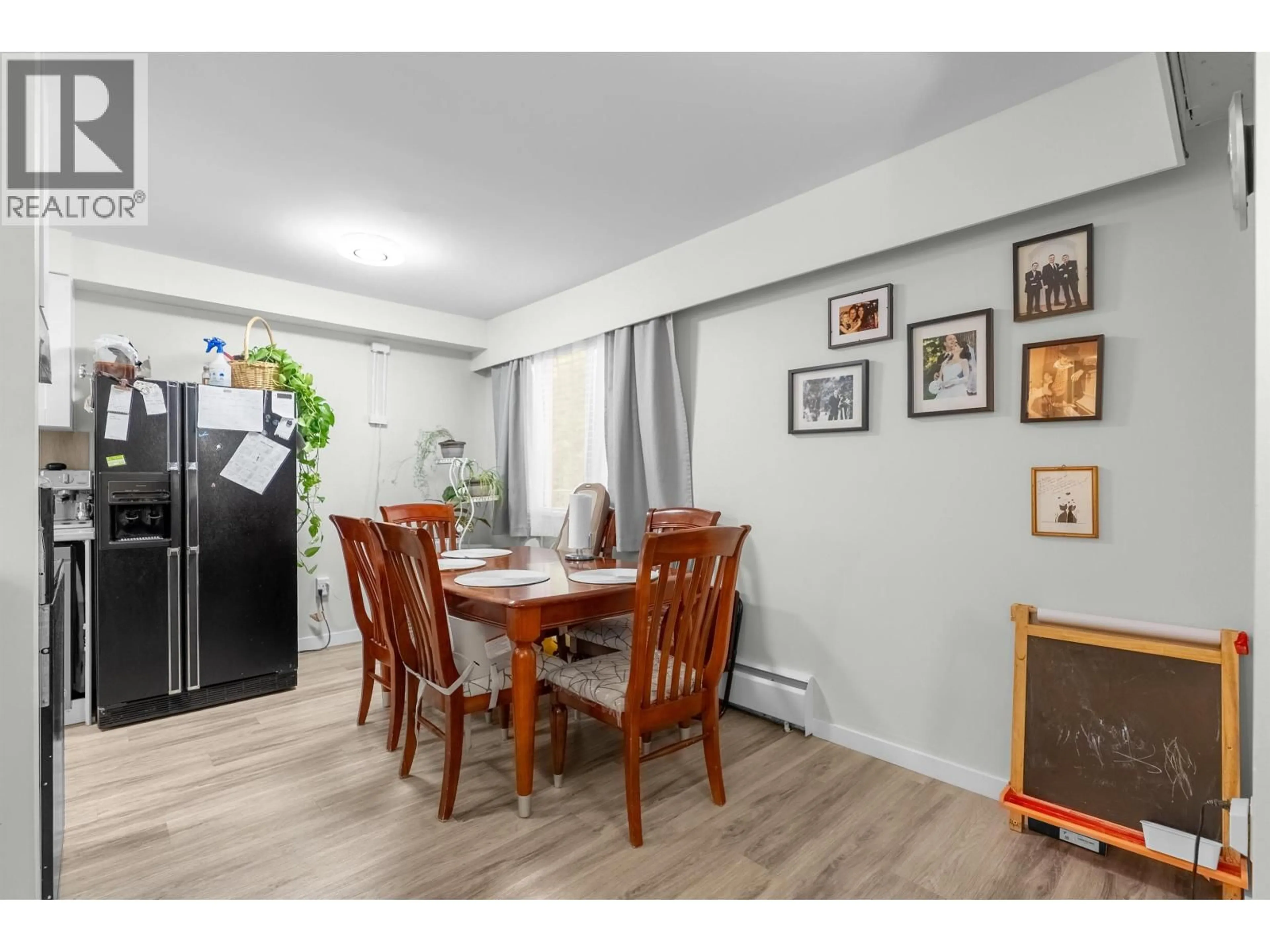 Dining room, wood/laminate floor for 101 - 515 ELEVENTH STREET, New Westminster British Columbia V3M4G4