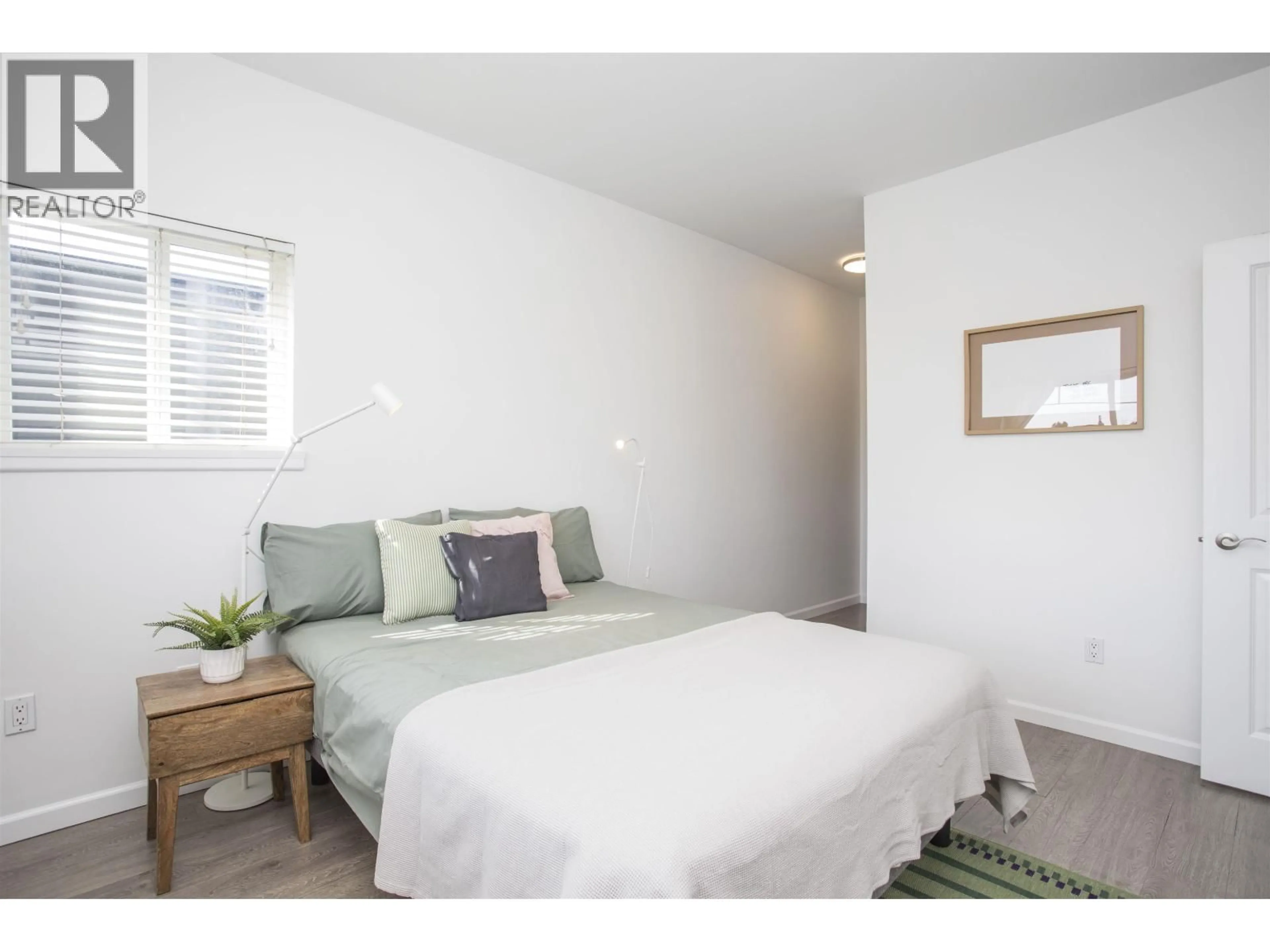 Bedroom with bed, wood/laminate floor for 302 - 22363 SELKIRK AVENUE, Maple Ridge British Columbia V2X2X6