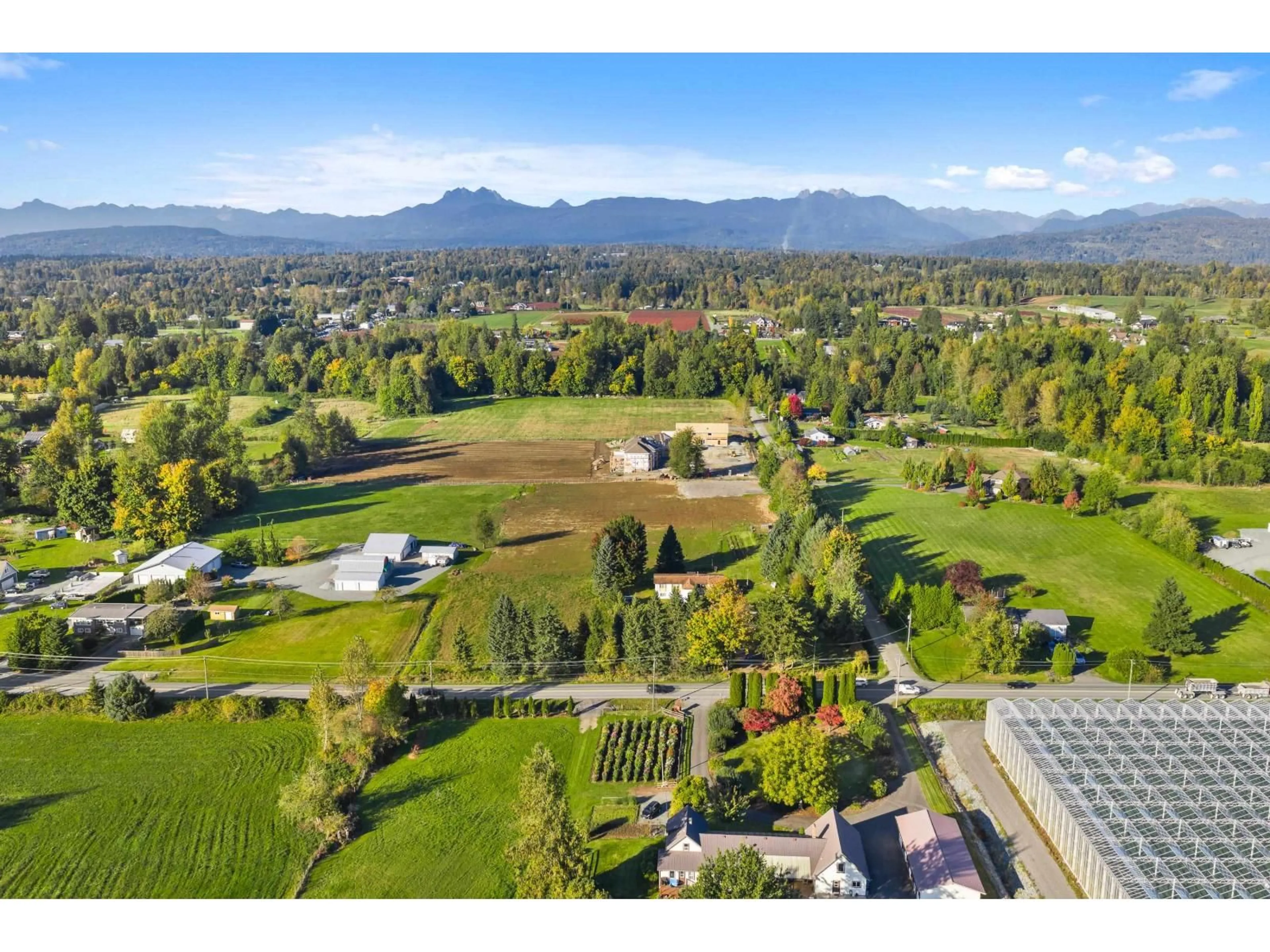 A pic from outside/outdoor area/front of a property/back of a property/a pic from drone, mountain view for 28991 TOWNSHIPLINE ROAD, Abbotsford British Columbia V4X1S2