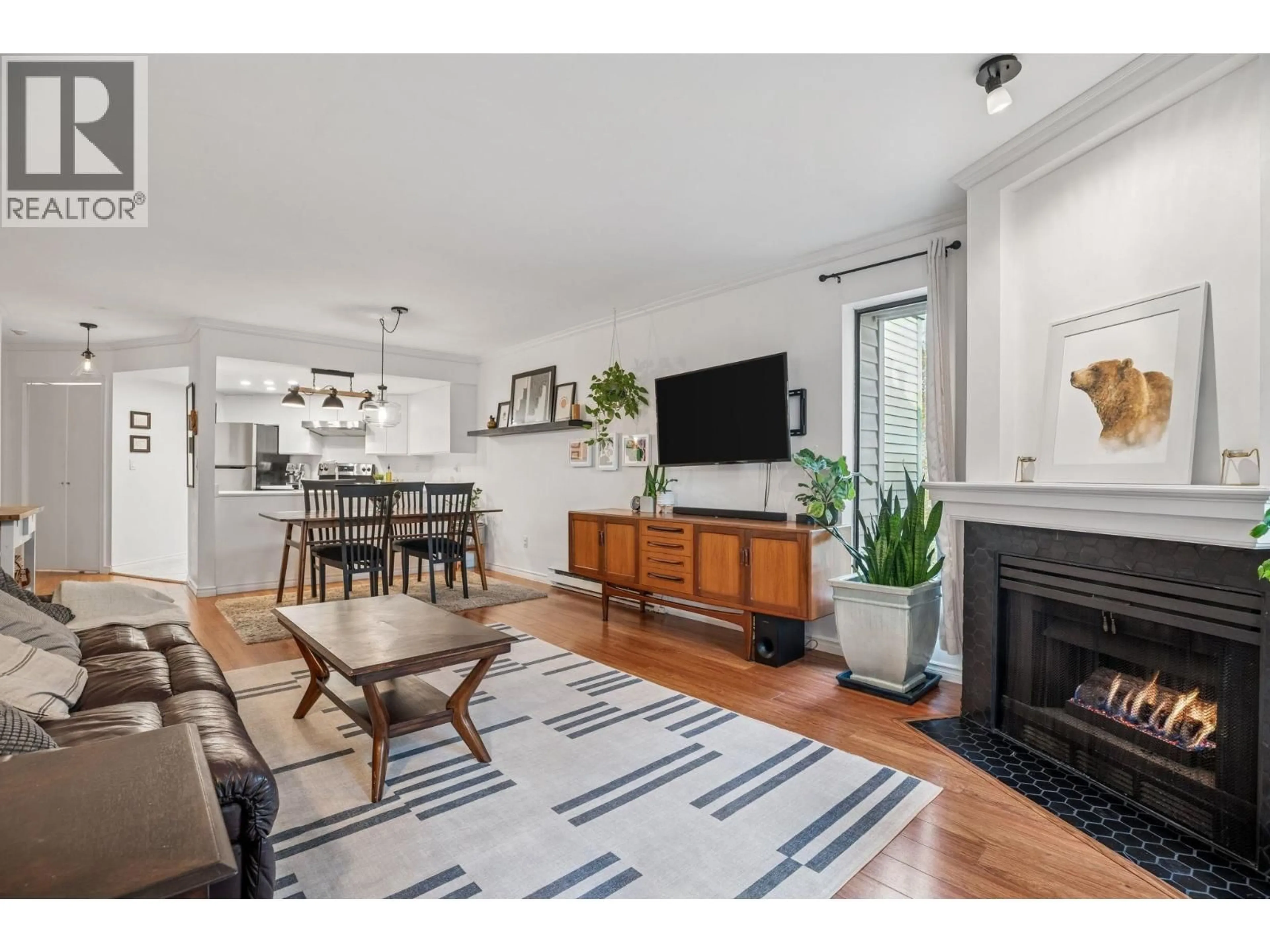 Living room with furniture, unknown for 410 - 2925 GLEN DRIVE, Coquitlam British Columbia V3B7H9