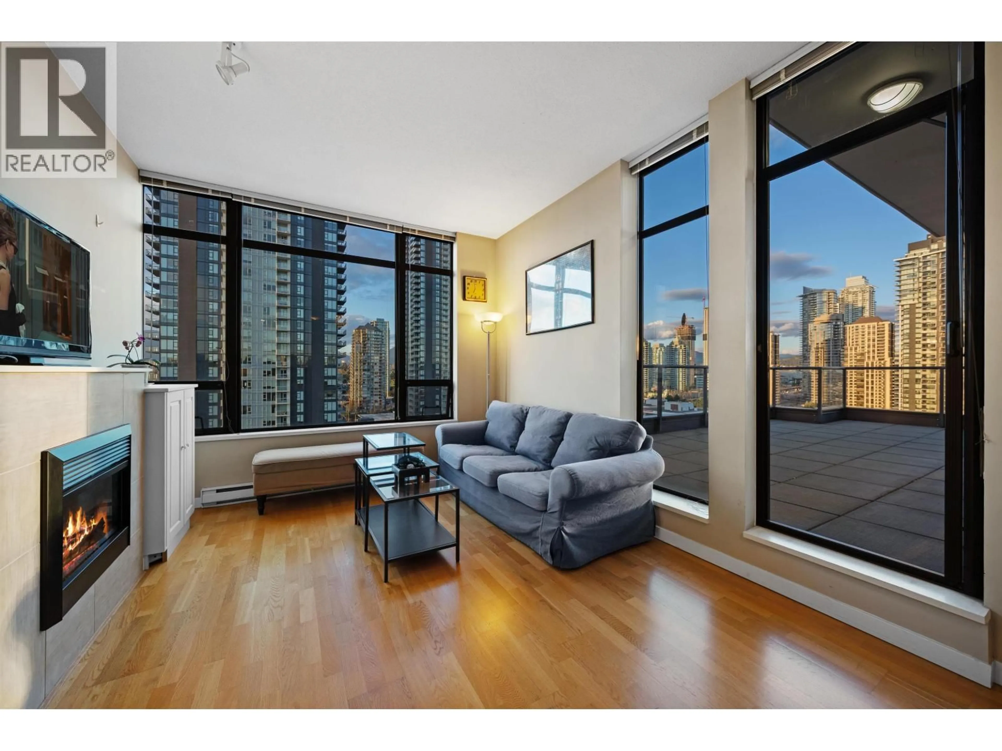 Living room with furniture, wood/laminate floor for 2102 - 4118 DAWSON STREET, Burnaby British Columbia V5C0A3