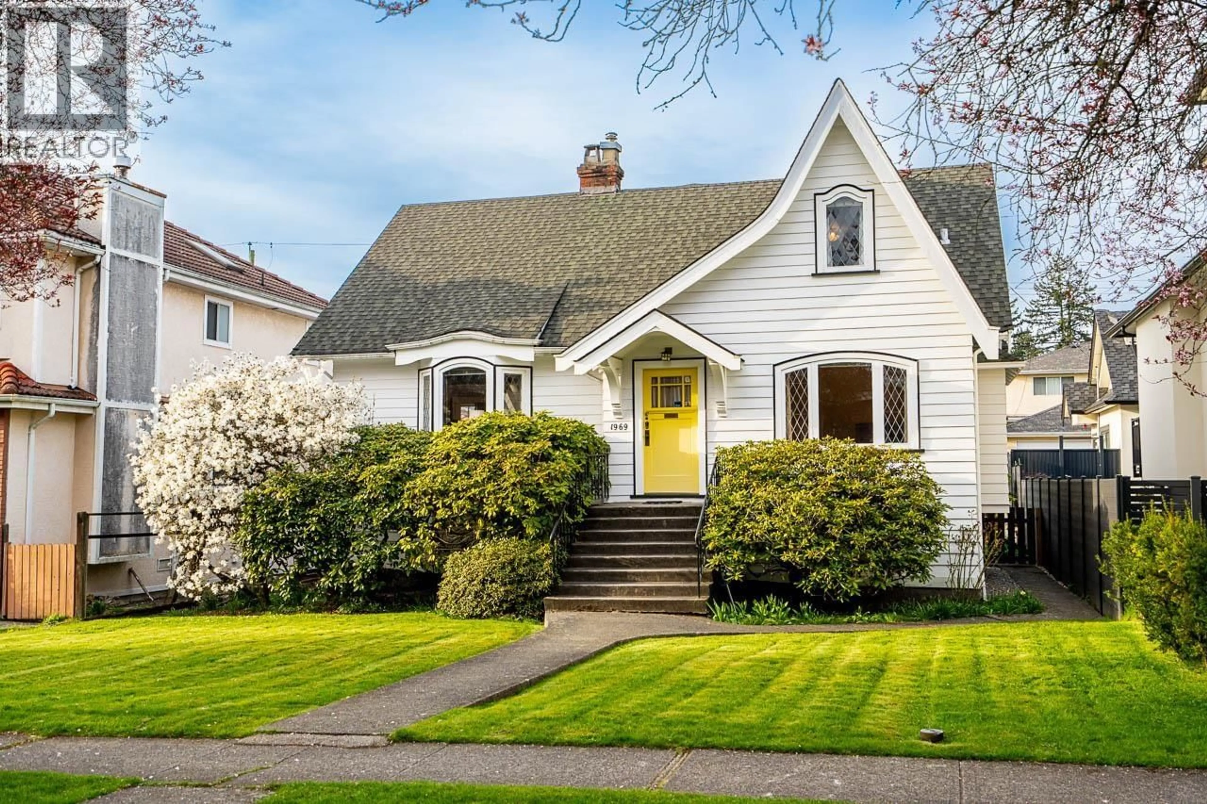 Home with vinyl exterior material, street for 1969 43RD AVENUE, Vancouver British Columbia V6M2C7