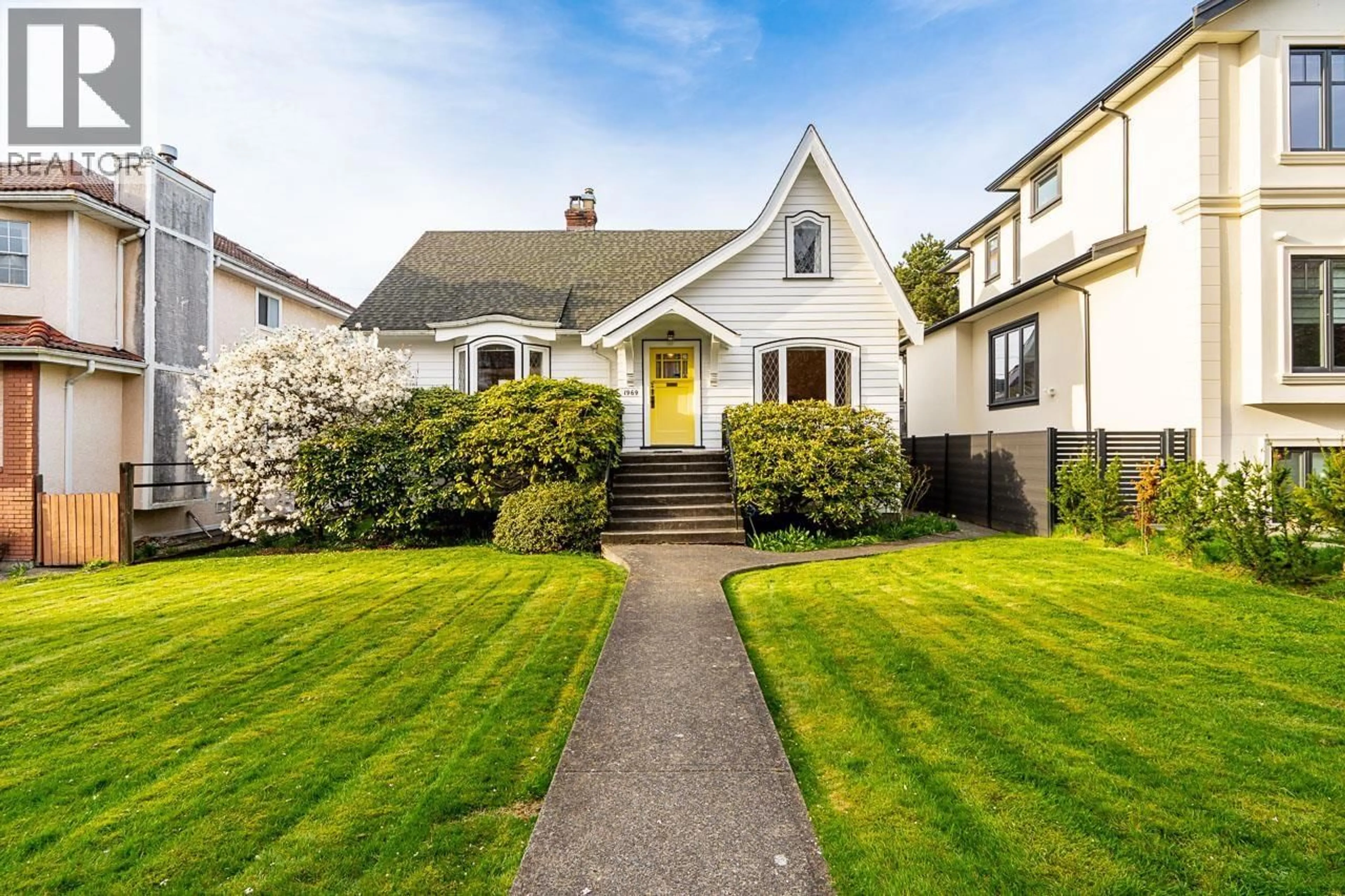 Home with vinyl exterior material, street for 1969 43RD AVENUE, Vancouver British Columbia V6M2C7