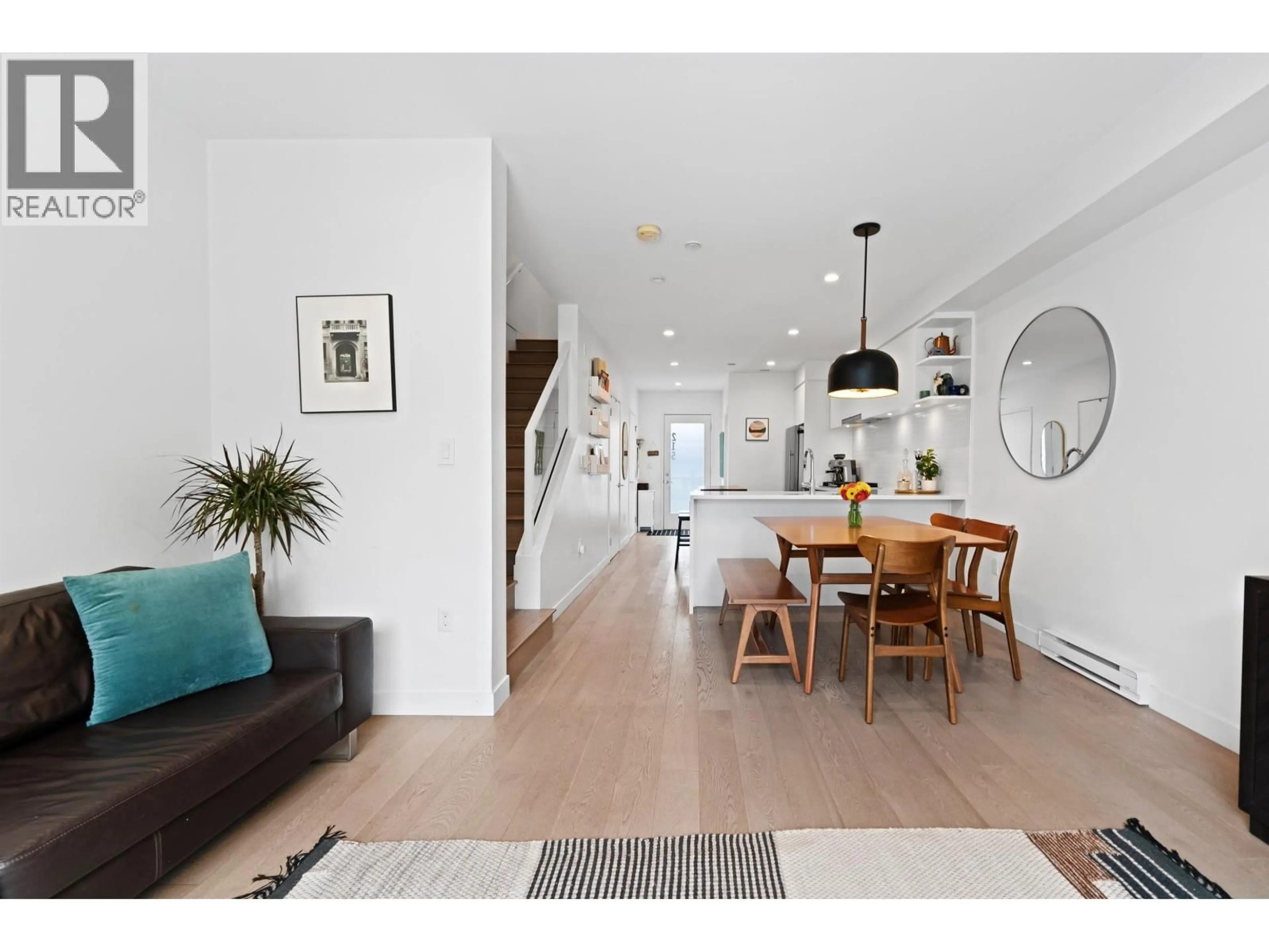 Open concept kitchen, wood/laminate floor for 215 - 311 16TH AVENUE, Vancouver British Columbia V5T2T7