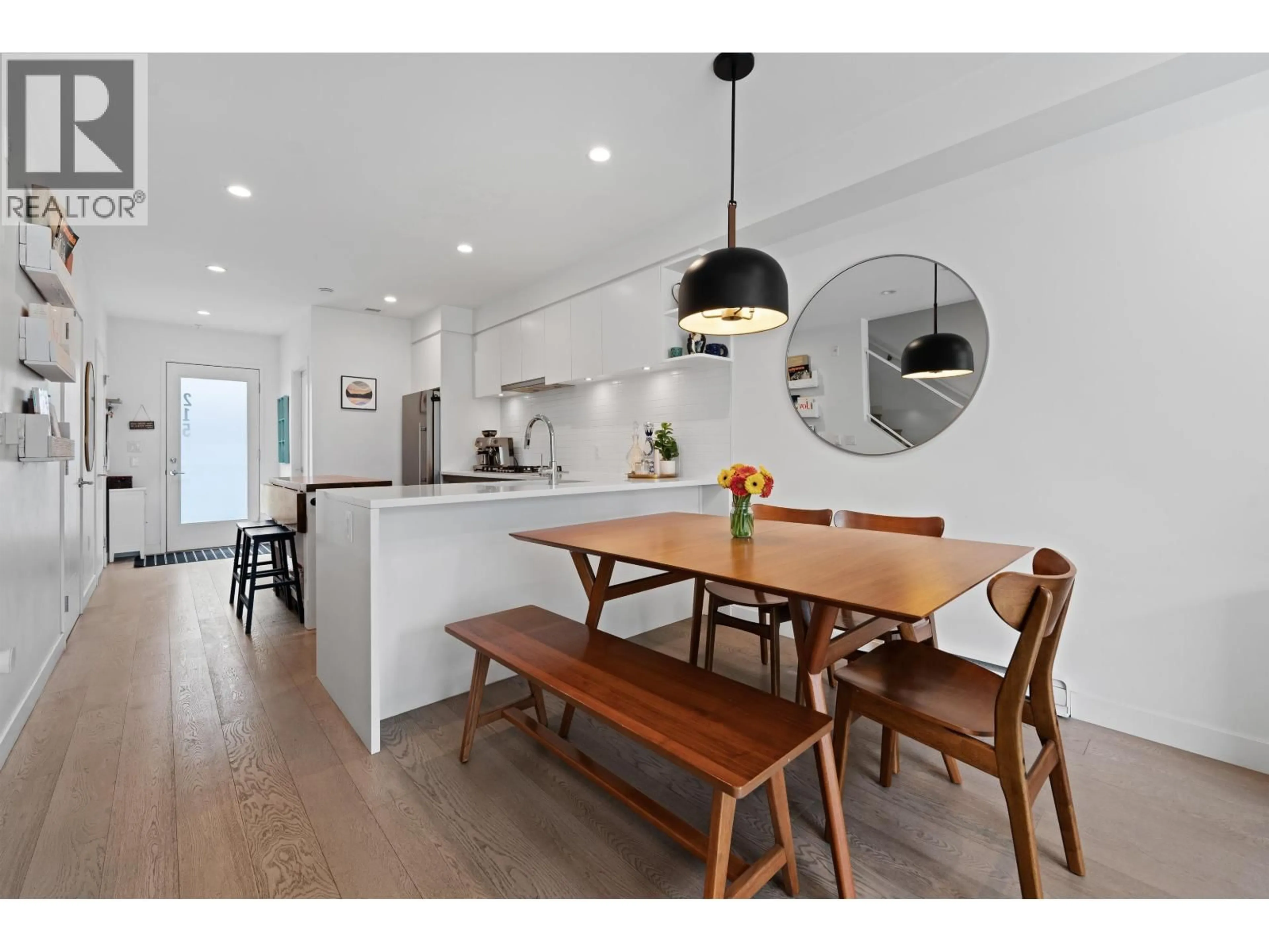 Open concept kitchen, wood/laminate floor for 215 - 311 16TH AVENUE, Vancouver British Columbia V5T2T7